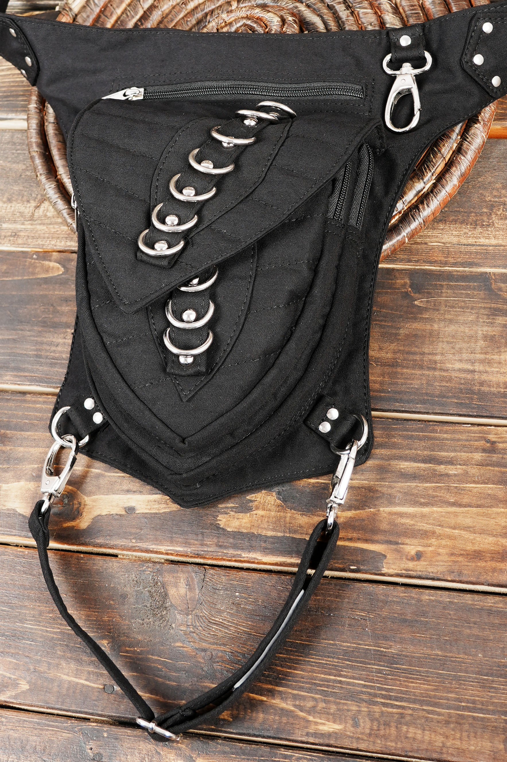 Gothic drop leg bag with silver rivets and lacing detail.