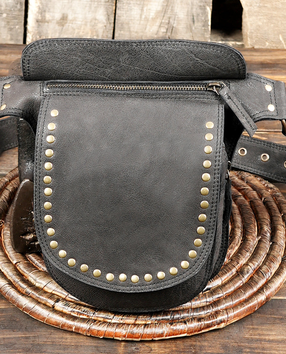 Black leather hip belt with handcrafted pouch and metal studs
