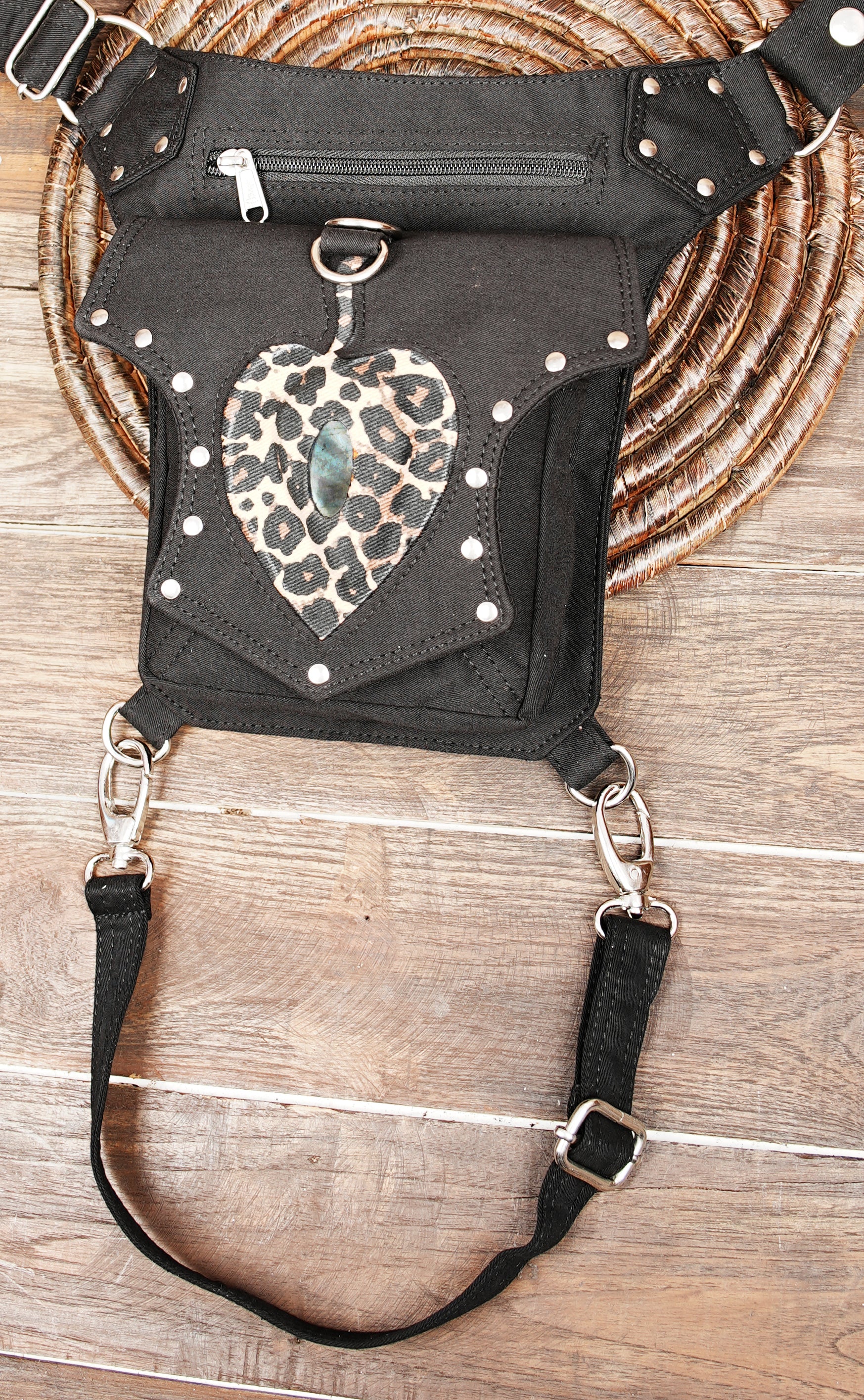 Alternative fashion black drop leg pouch featuring a leopard heart design