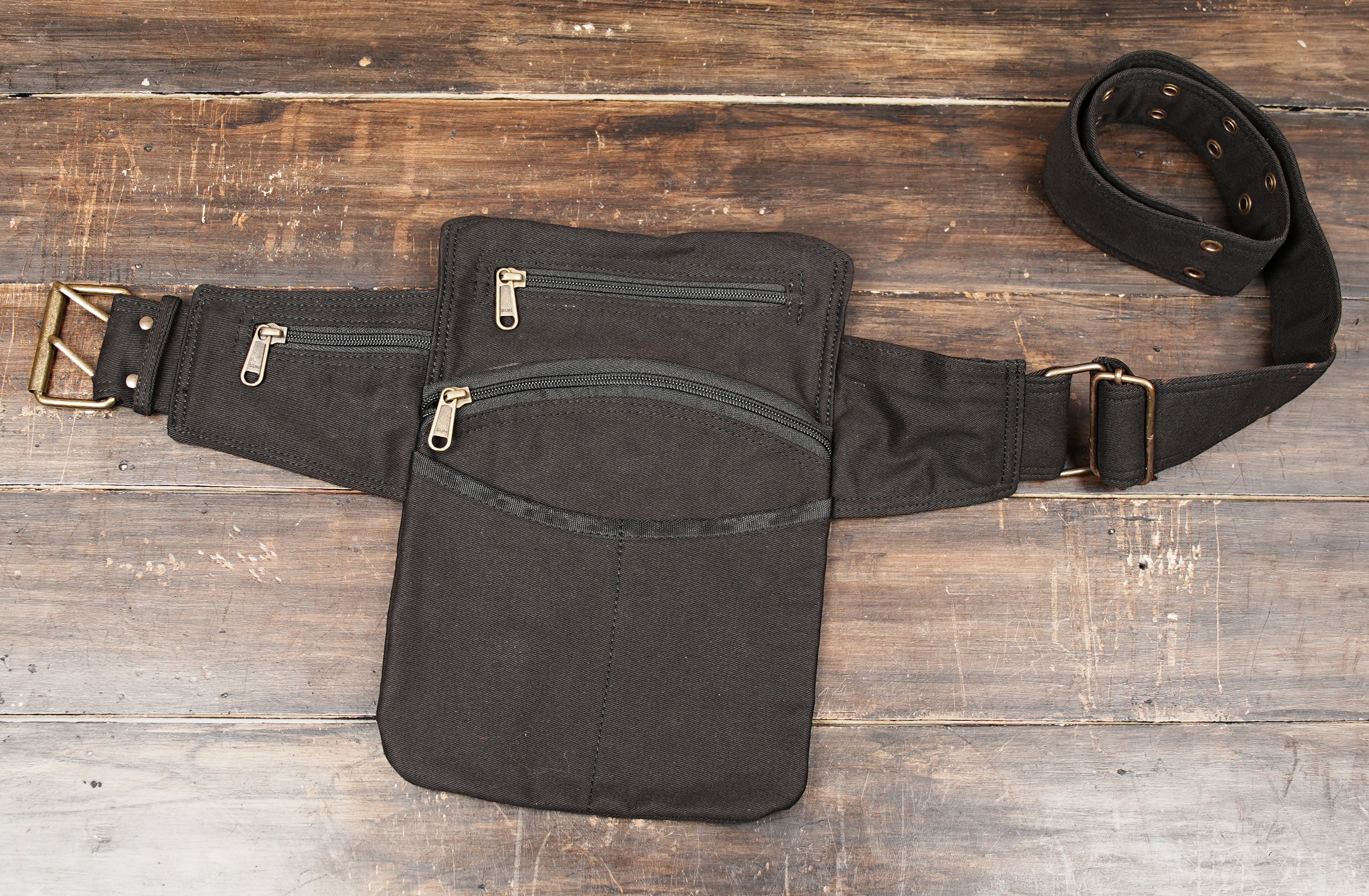 Handmade cotton hip bag with antique brass hardware and storage pockets