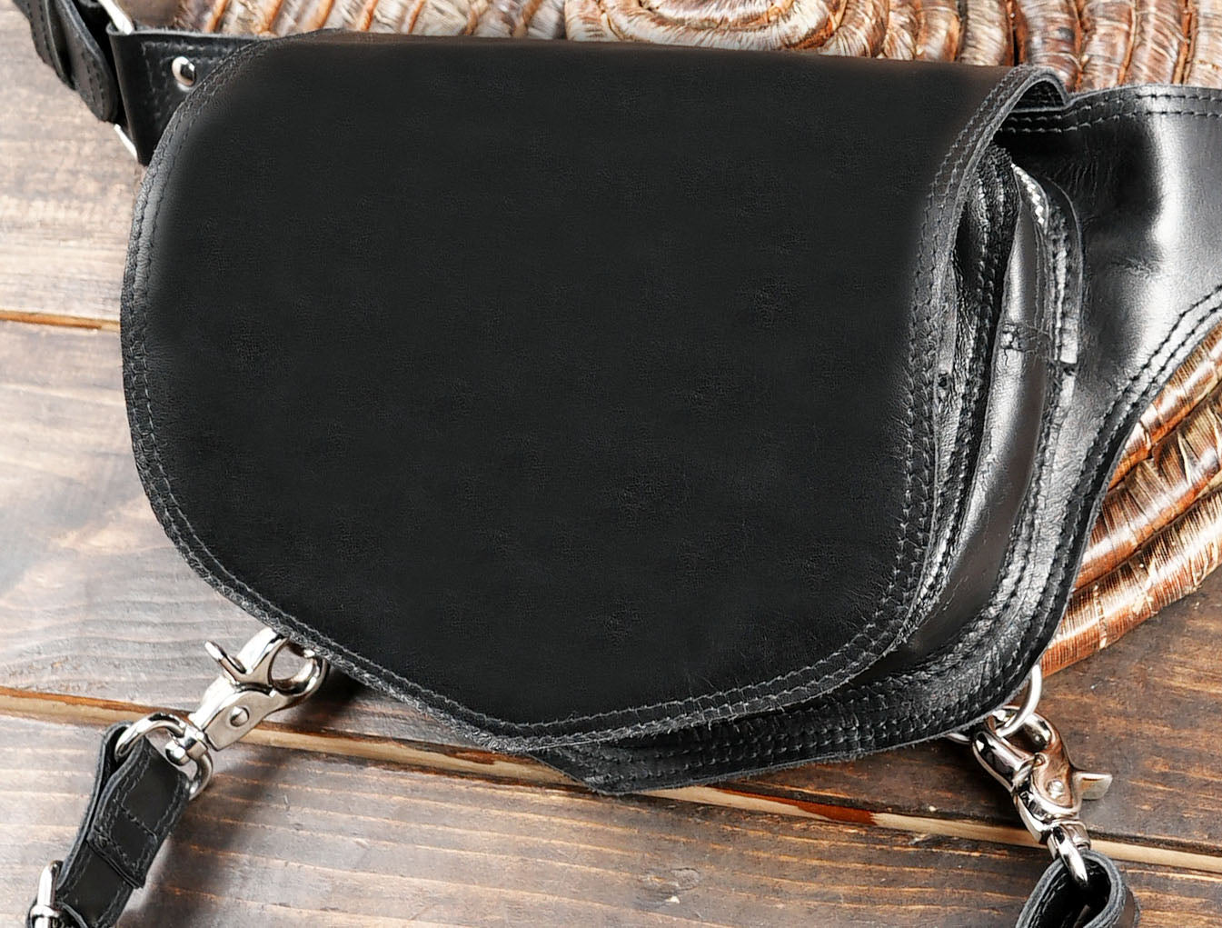 Black leather holster bag for men and women with rustic design