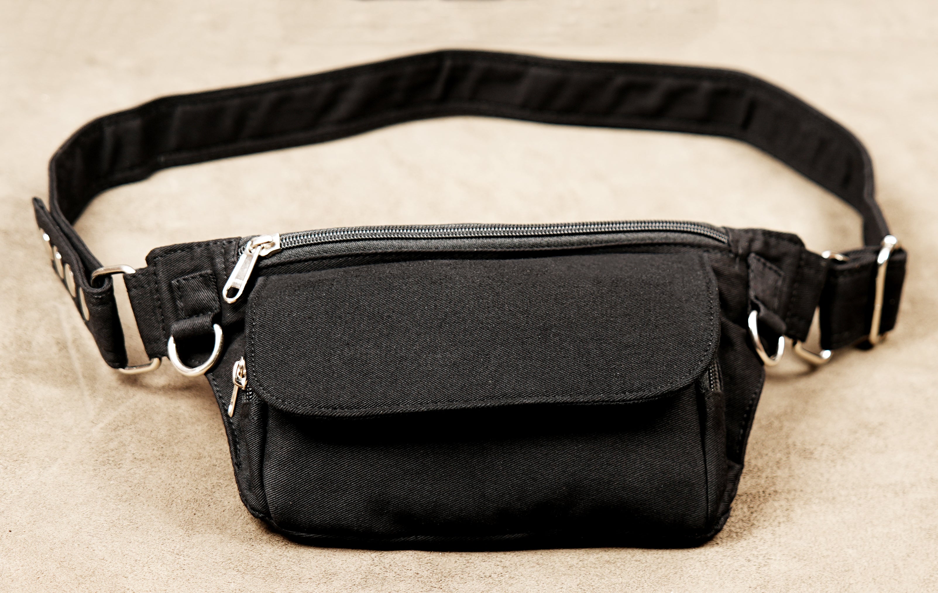 Adjustable utility hip bag in black for alternative and festival fashion.
