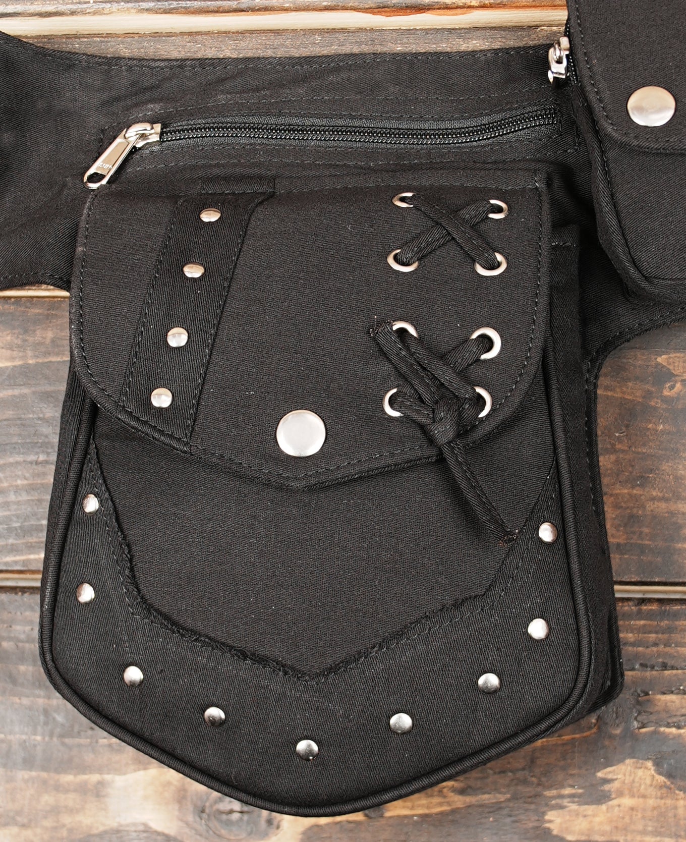 Utility waist bag with secure pockets and antique silver hardware