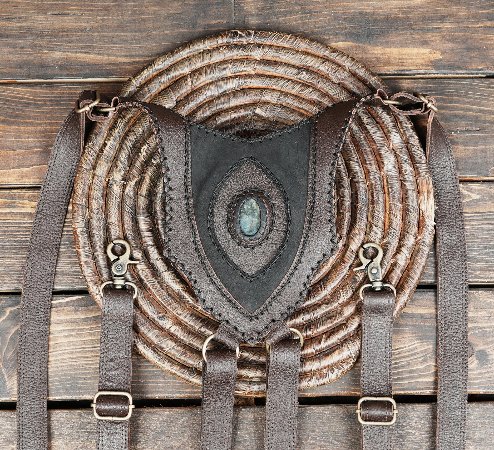 Artisan leather festival holster with two storage pouches and rustic hardware