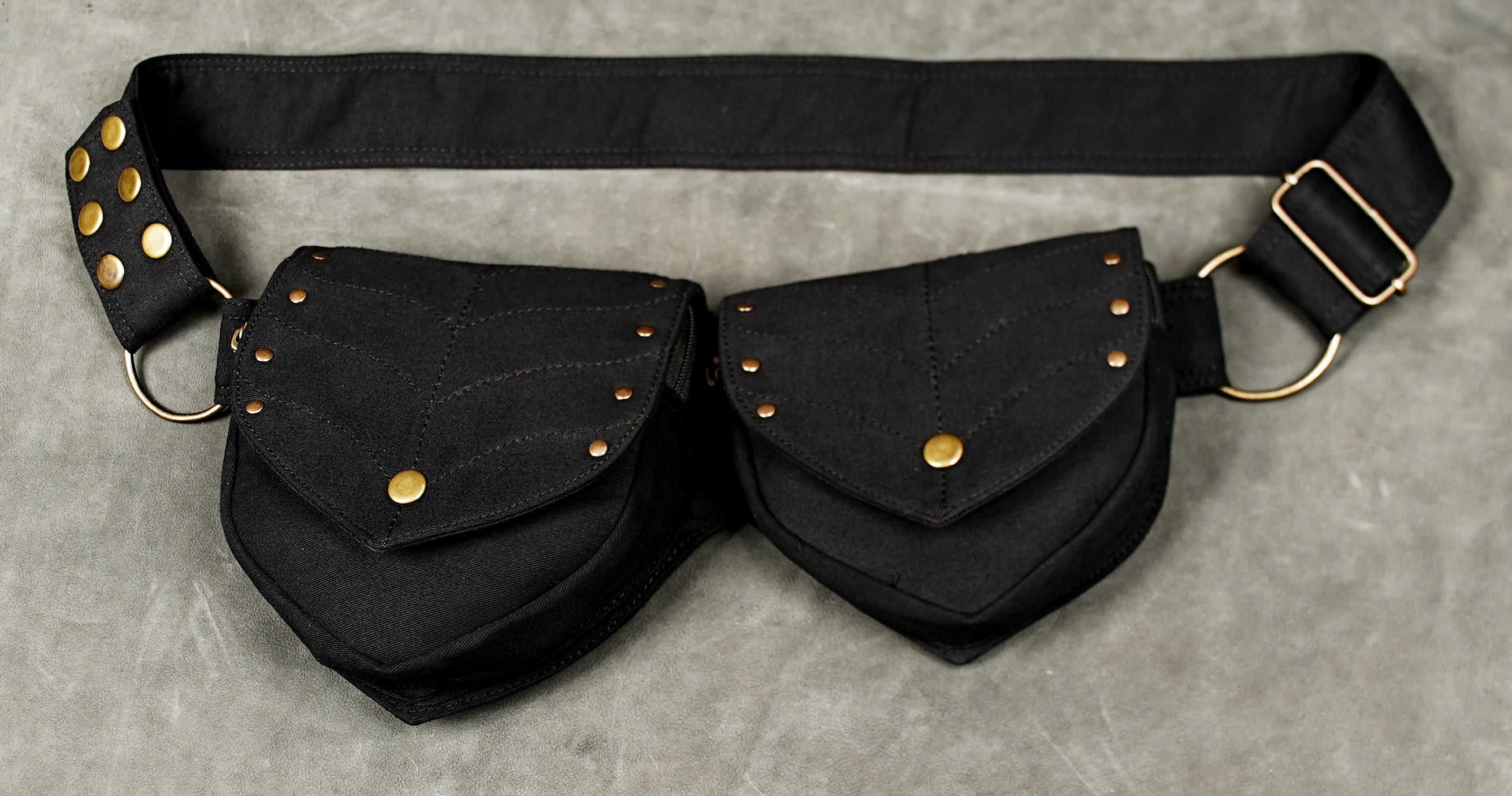 Handmade black canvas hip belt bag with brass rivets and adjustable buckle