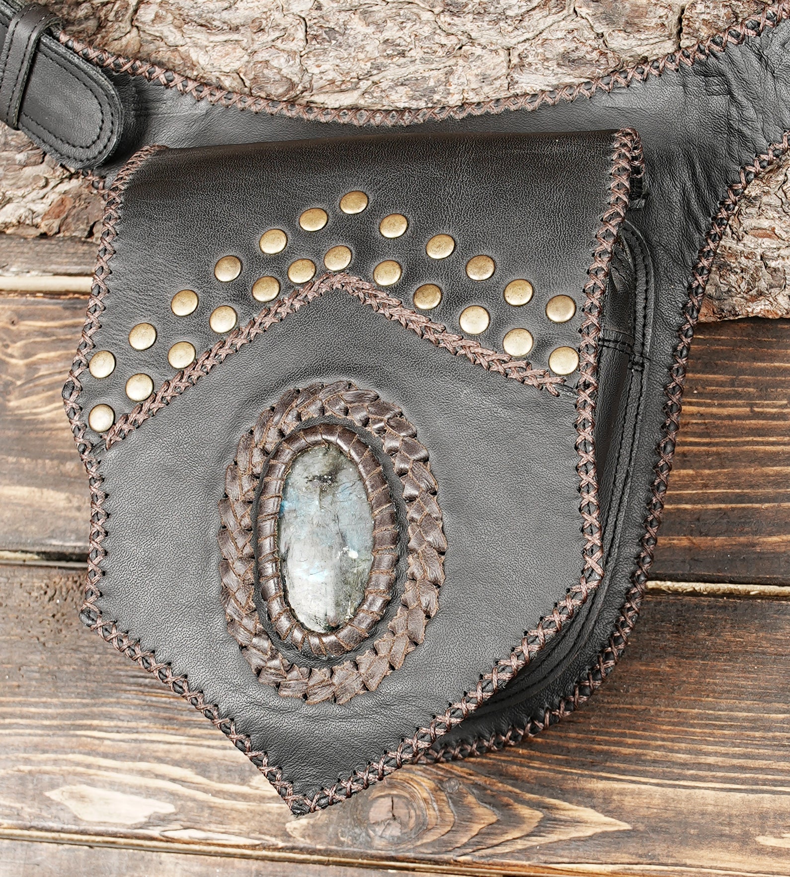 Festival-ready leather waist bag with gemstone centerpiece