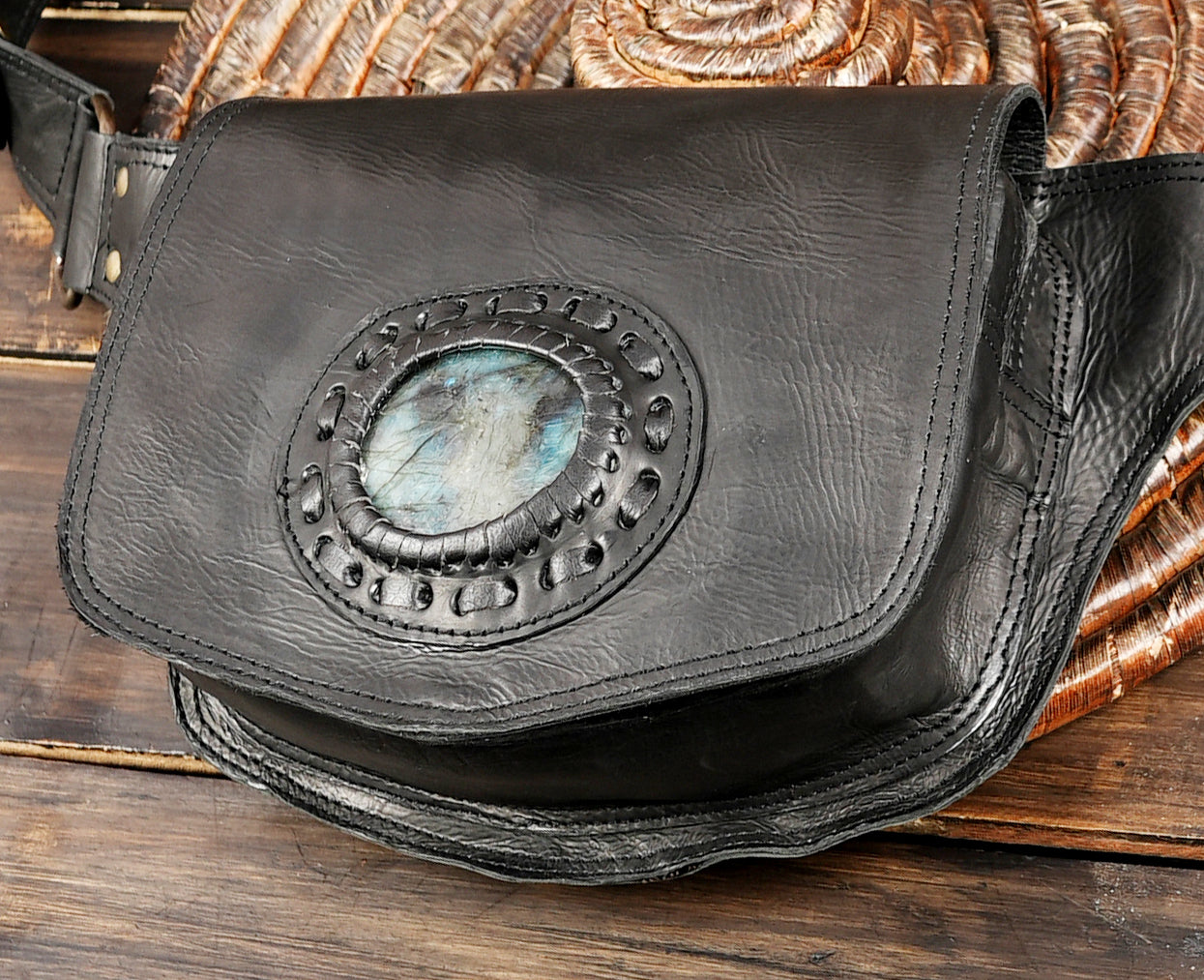 Handmade leather waist pouch with adjustable strap and gemstone accent