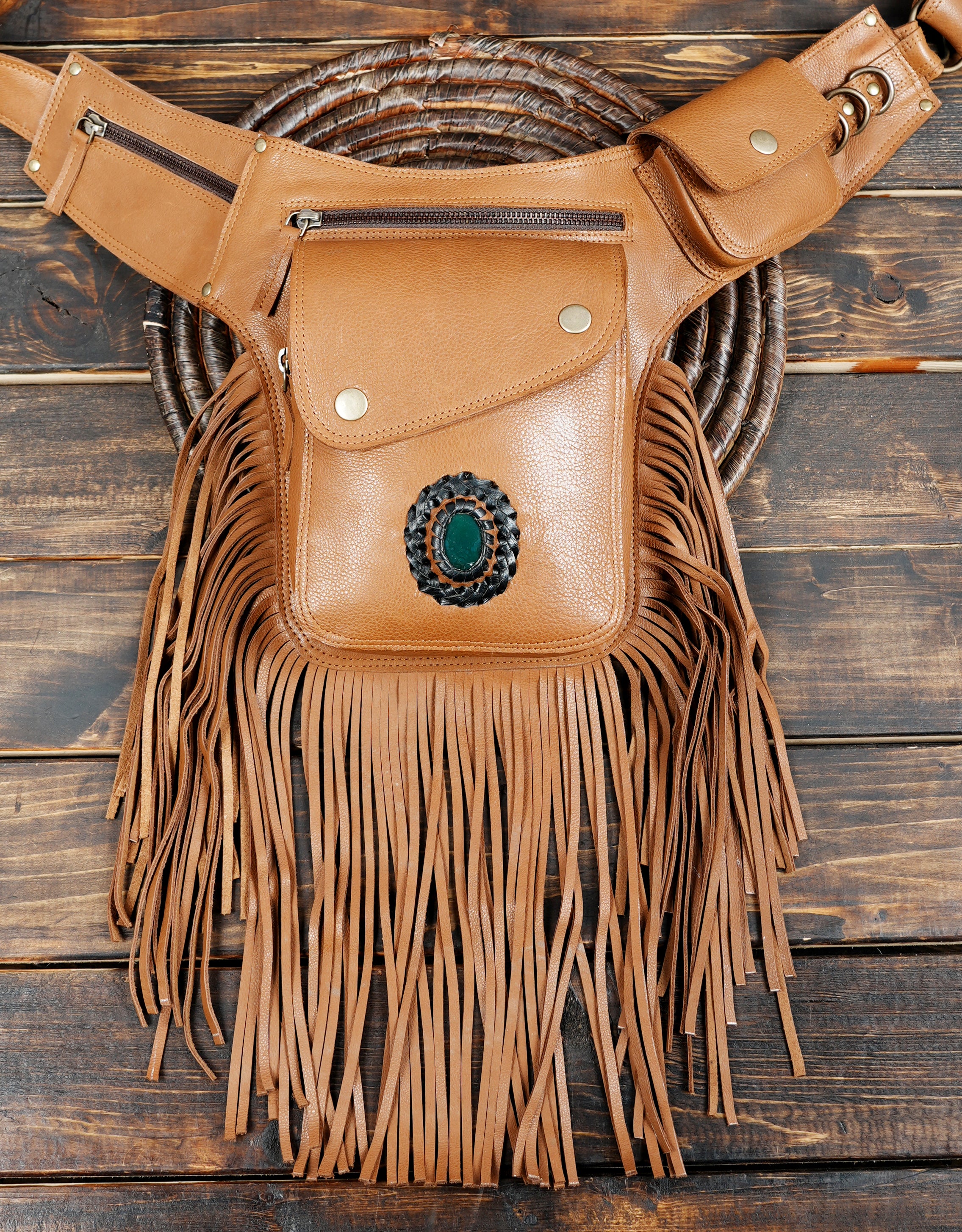 Artisan leather hip belt with gemstone centerpiece and tassels