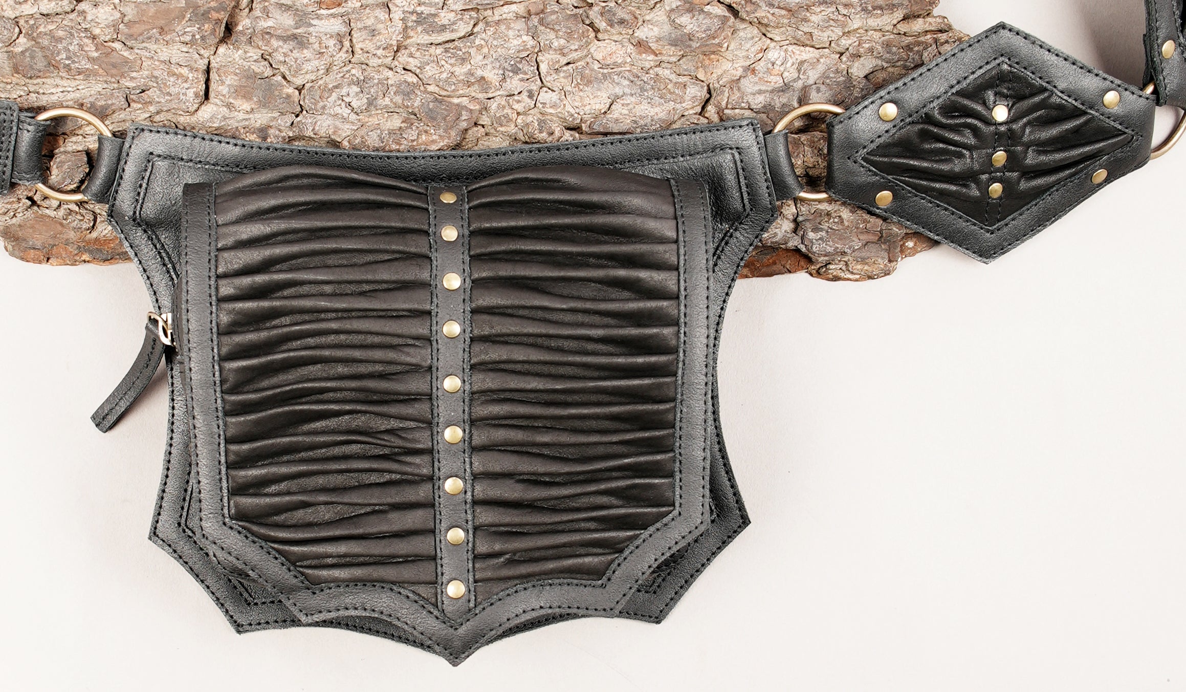 Black leather hip belt with front utility pouch and studs