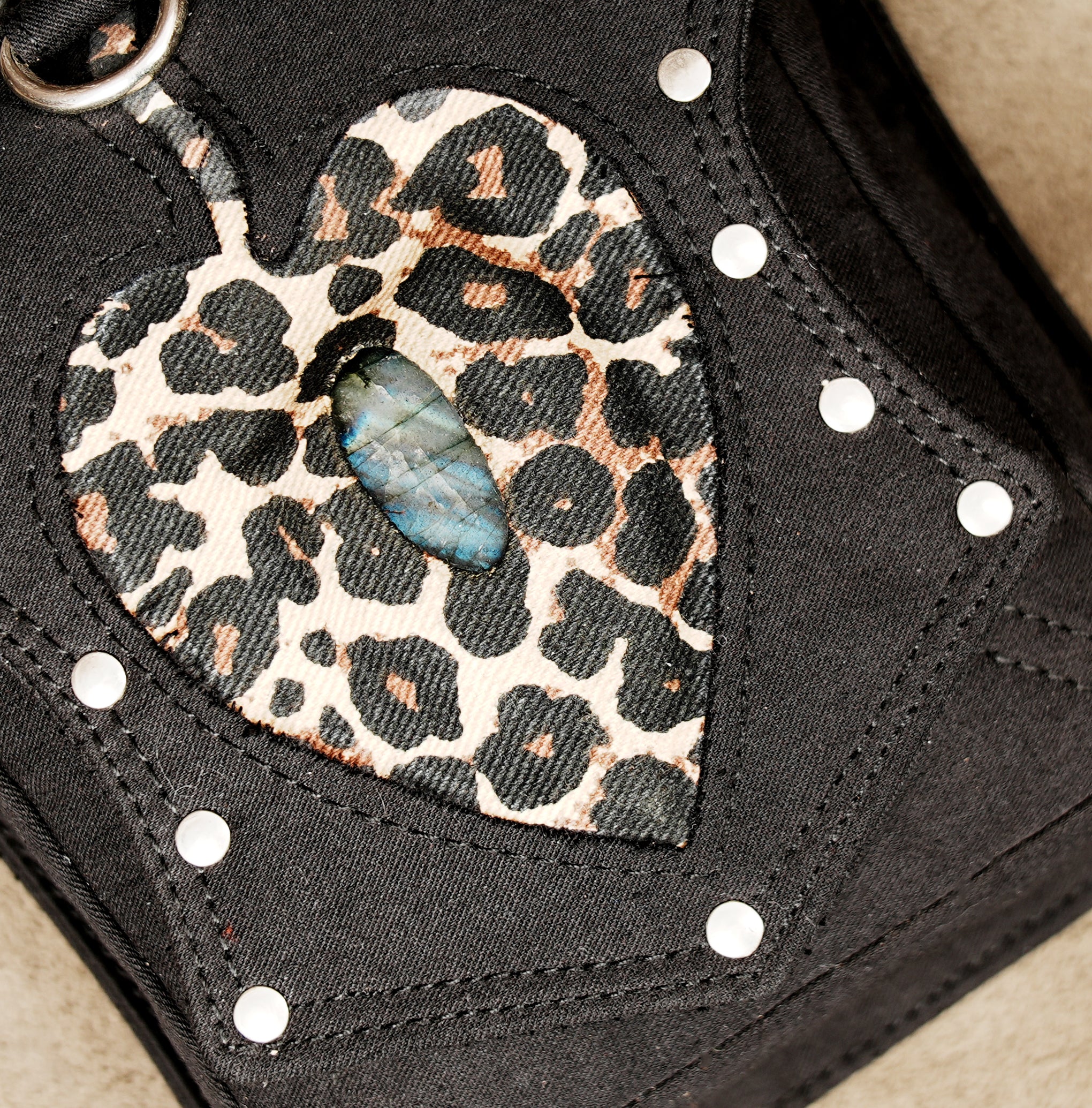 Black utility holster-style bag with an adjustable waist belt and a second detachable thigh strap.