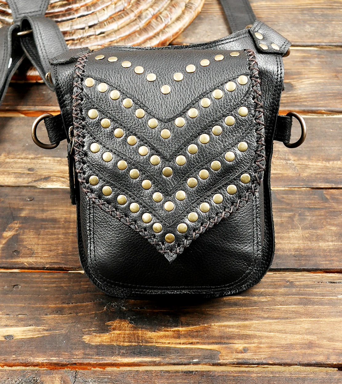 Studded leather dual pouch holster with adjustable straps