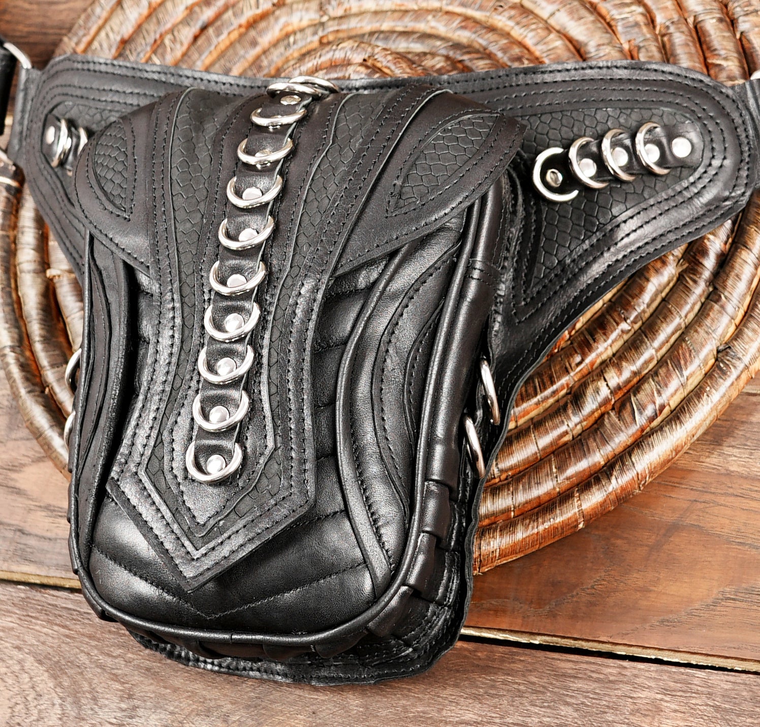 Black leather utility belt with decorative metal loops