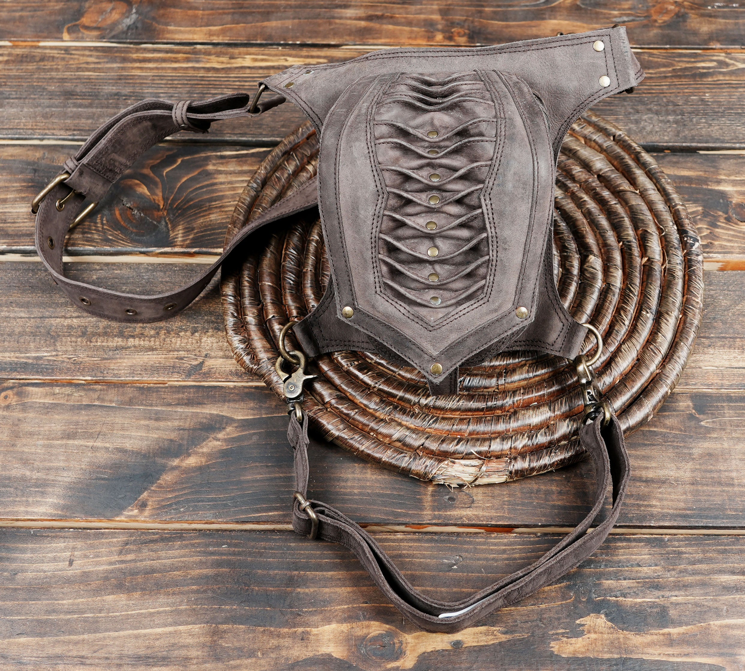 This Handmade Brown Leather Waist & Thigh Belt is a perfect combination of craftsmanship, practicality, and bold style.