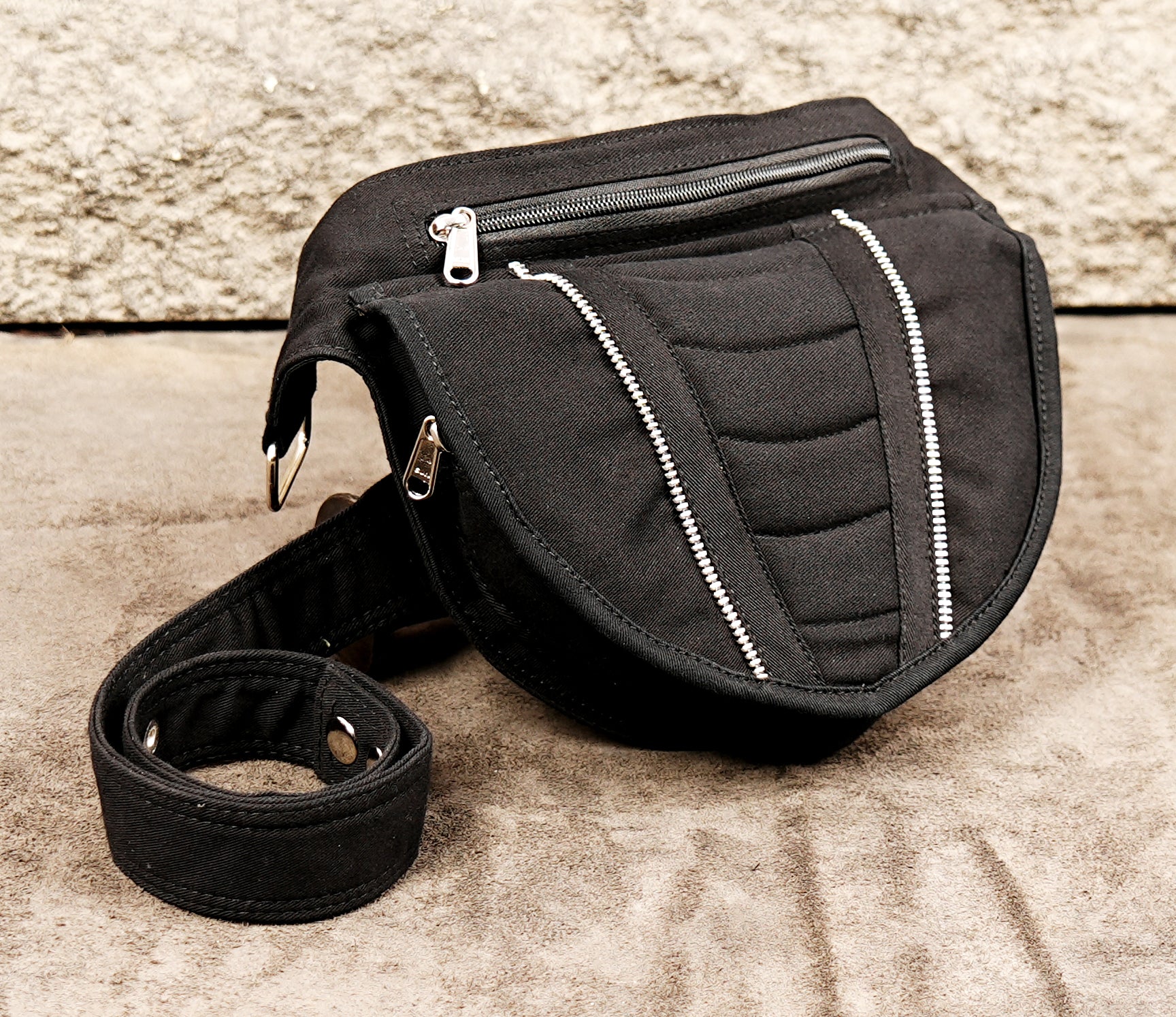 Black utility belt bag with silver zipper details
