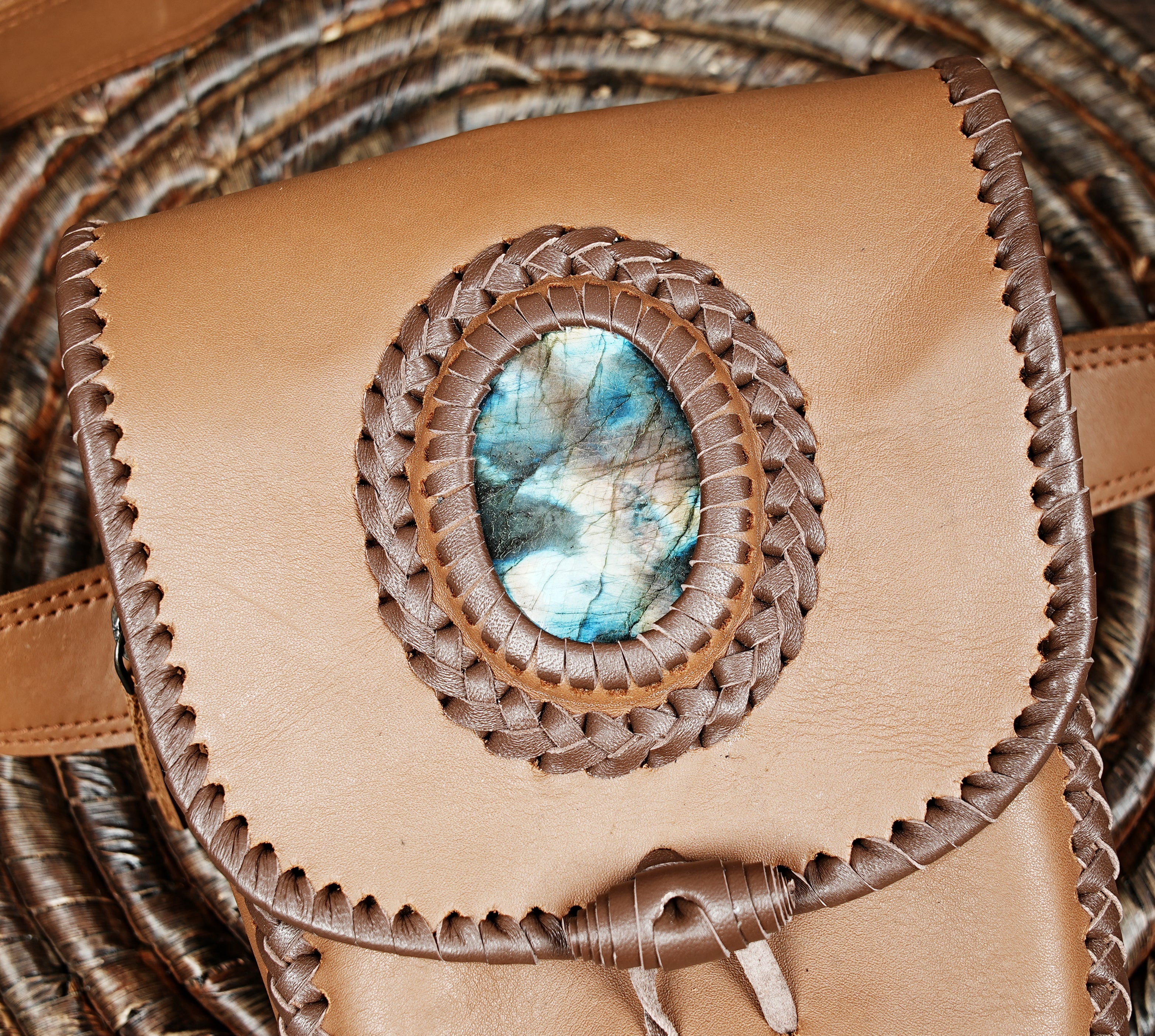 Handmade leather waist belt bag with adjustable strap and stone accent