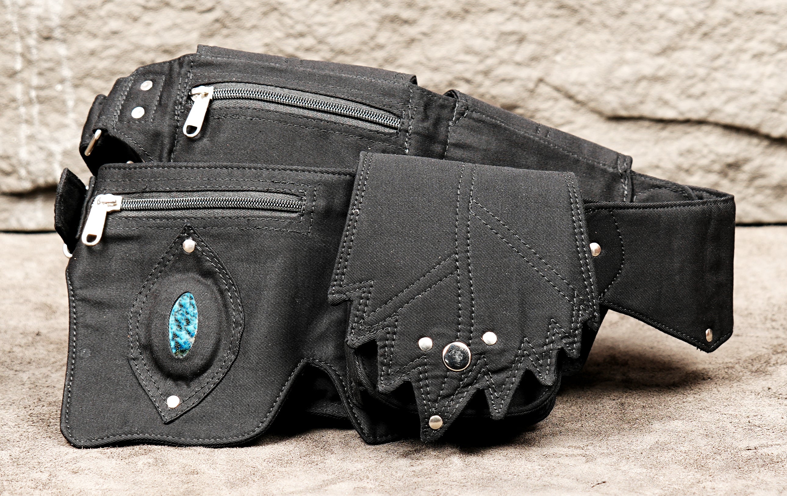 Edgy black studded utility hip belt with steampunk and cyberpunk vibes.