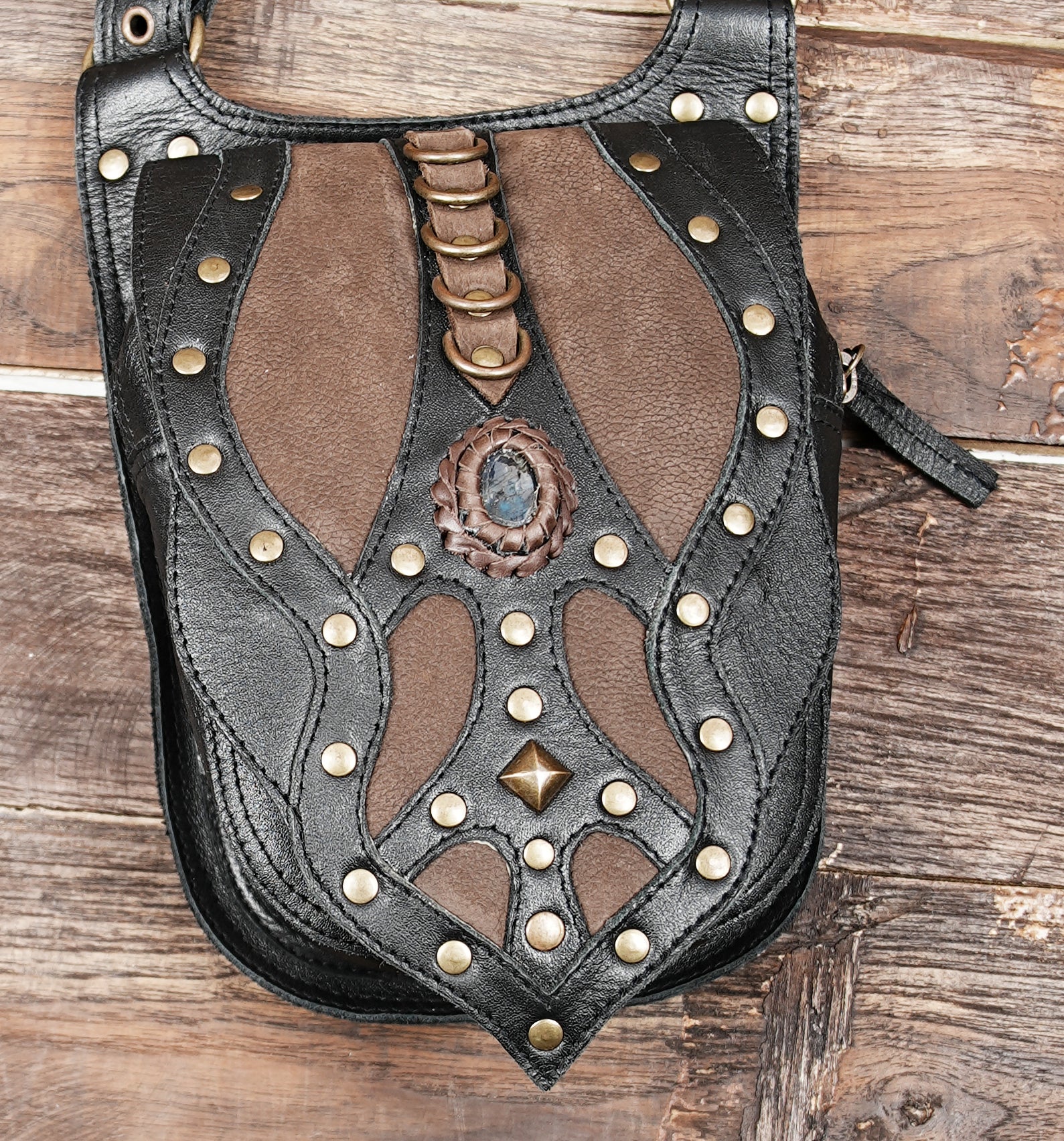 artisan leather double holster belt bag with decorative stitching and metal studs