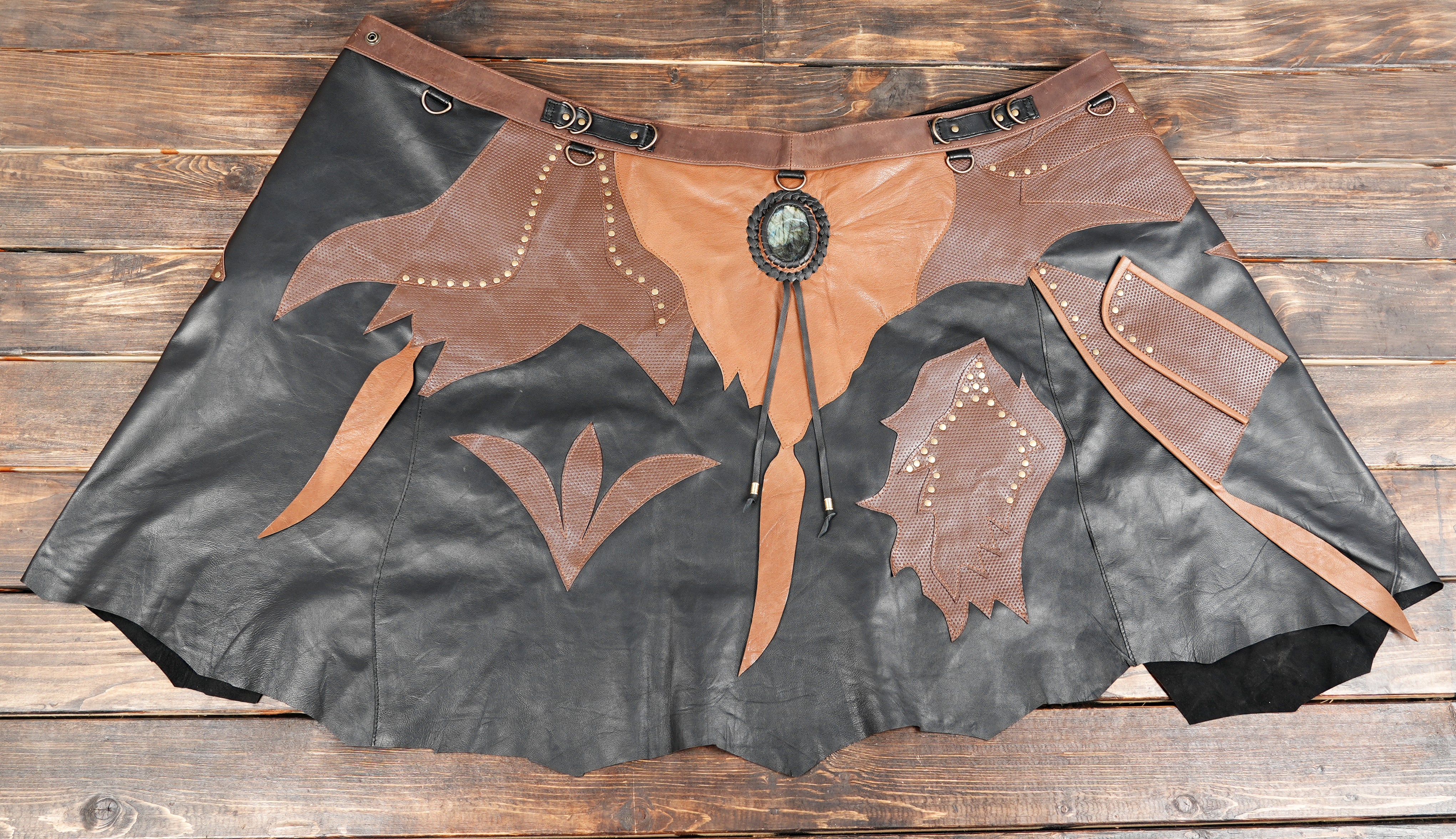 Statement leather skirt with artistic layered leather panels