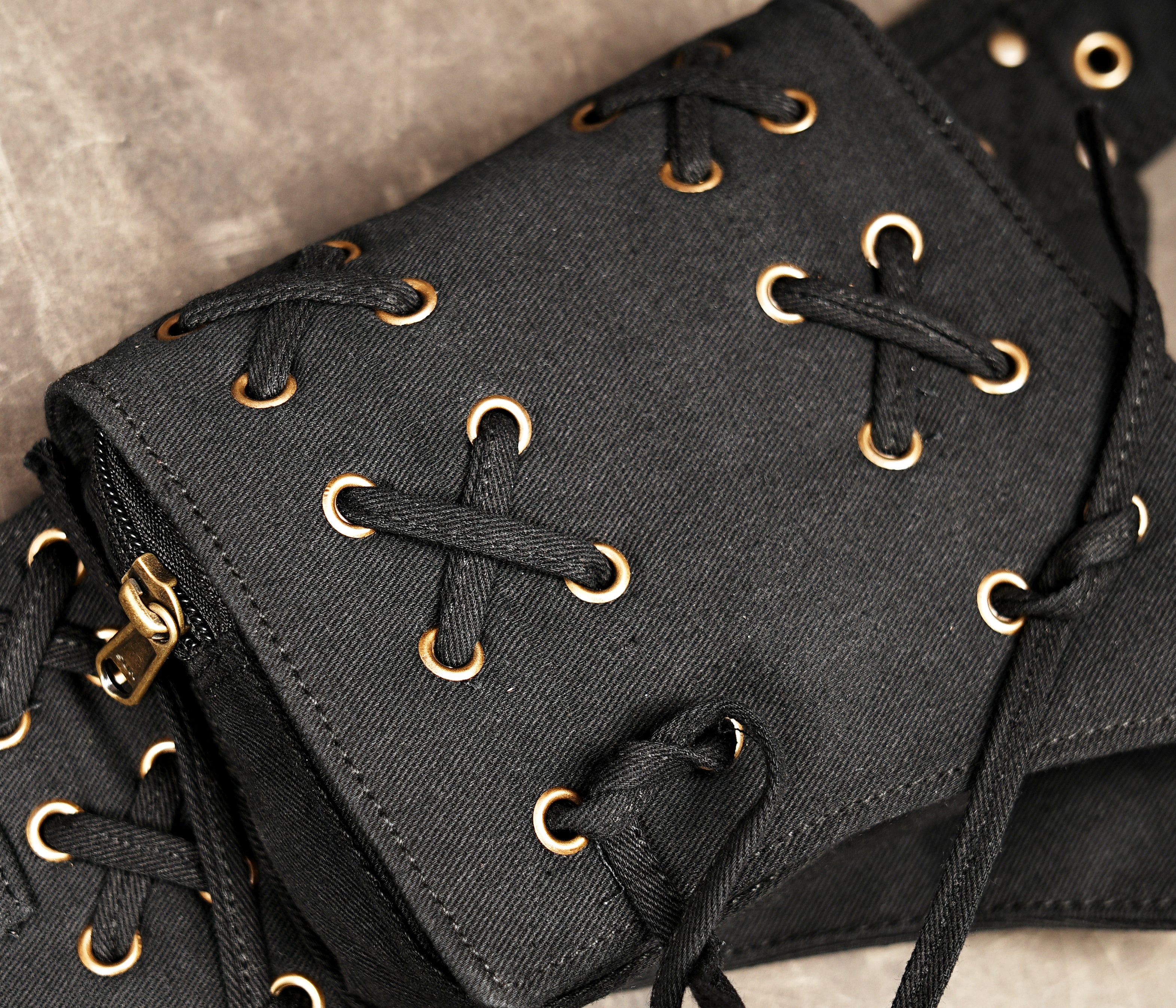 Black gothic belt bag with antique brass details