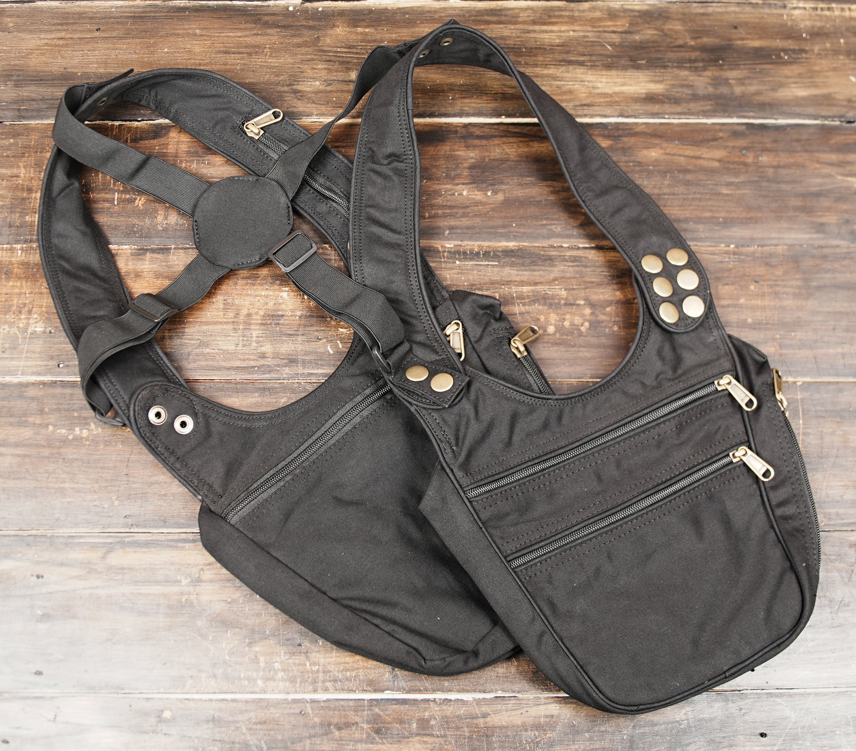 Black cotton holster harness with reinforced shoulder straps