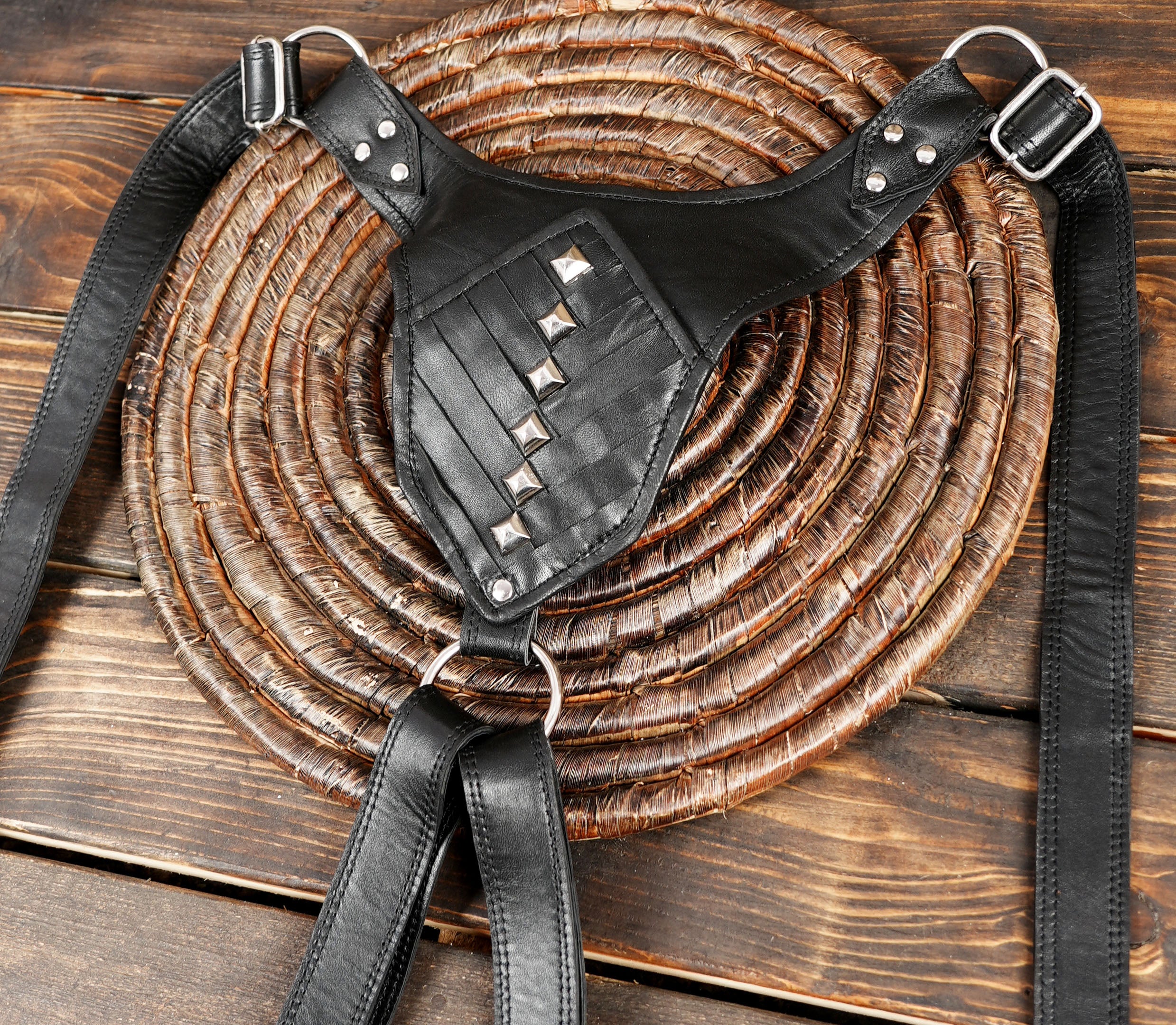 Gothic leather shoulder holster with silver spikes and rivets