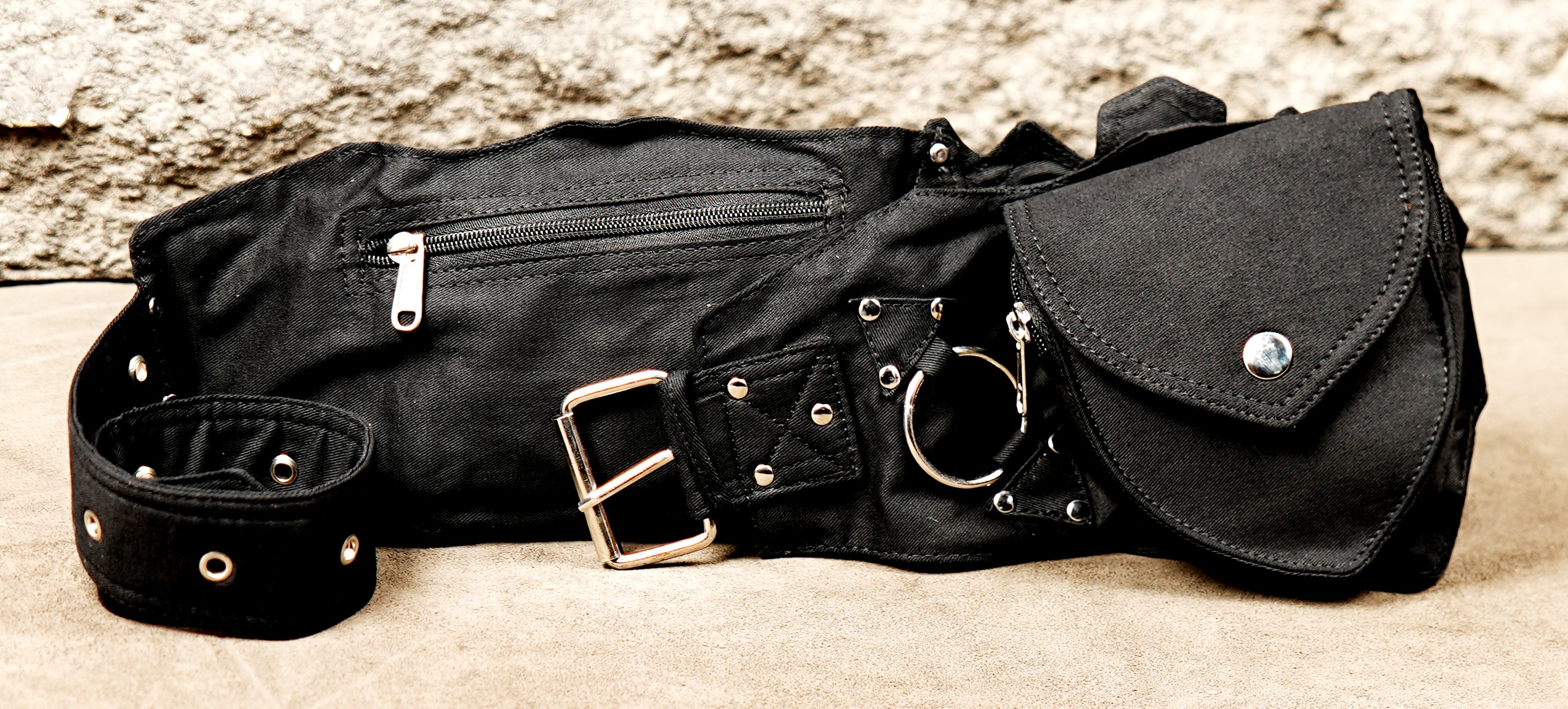 Edgy black studded utility hip belt with steampunk and cyberpunk vibes.