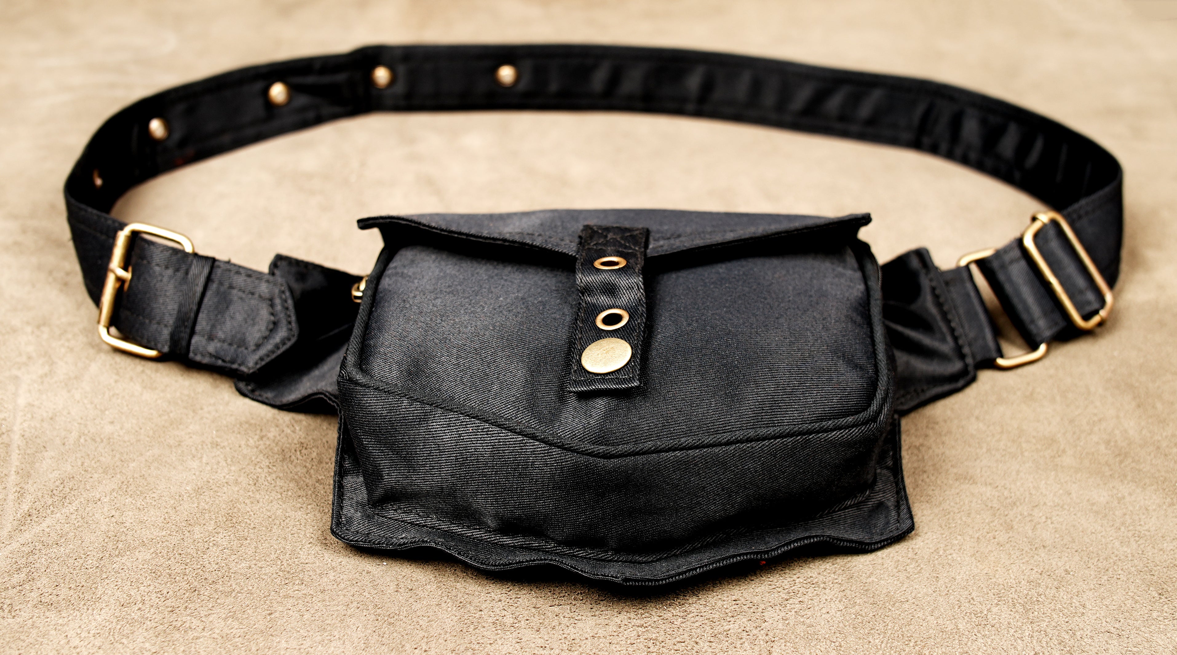 Edgy street style black cotton hip bag with metal studs