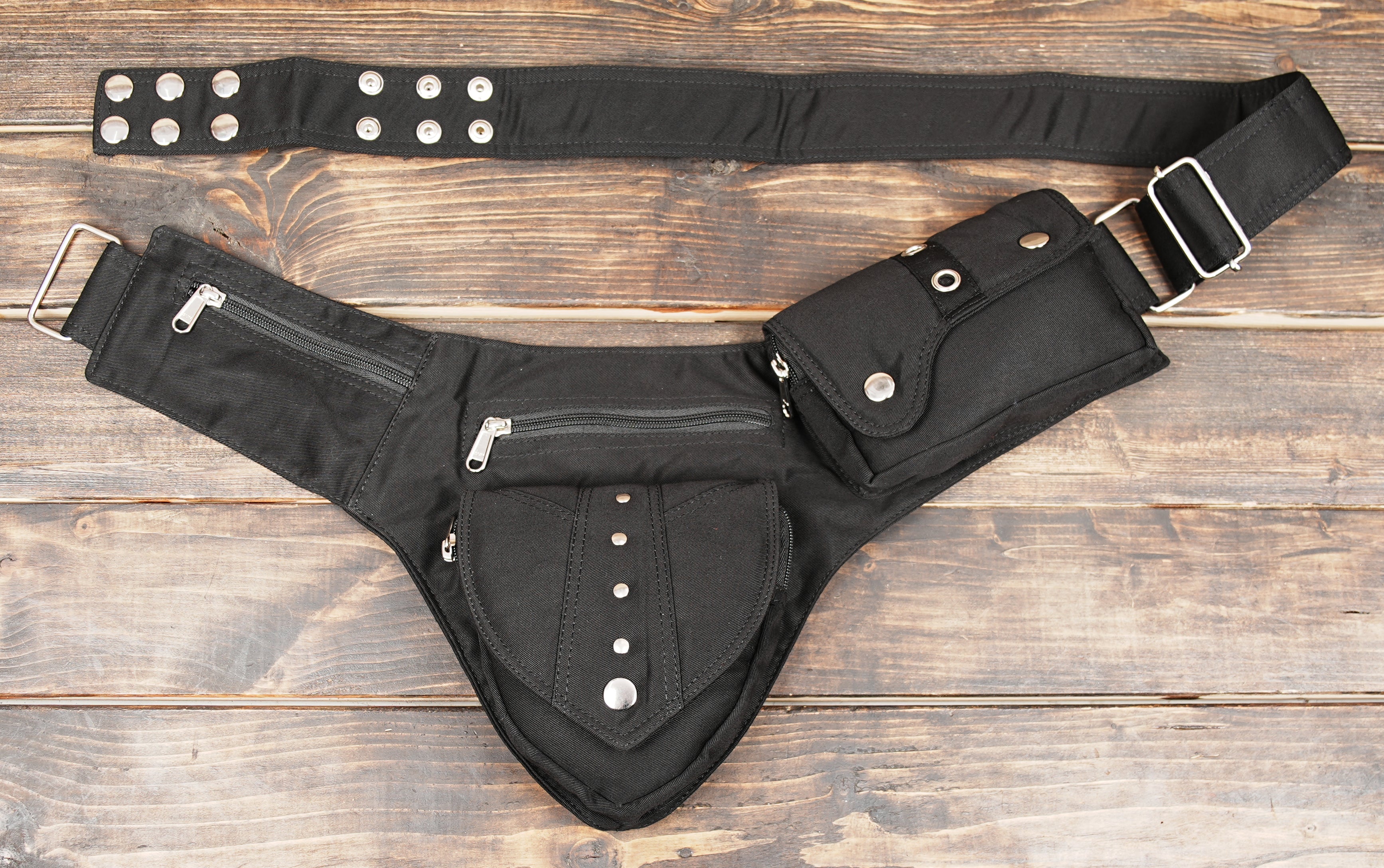 Black canvas fanny pack for hiking and travel