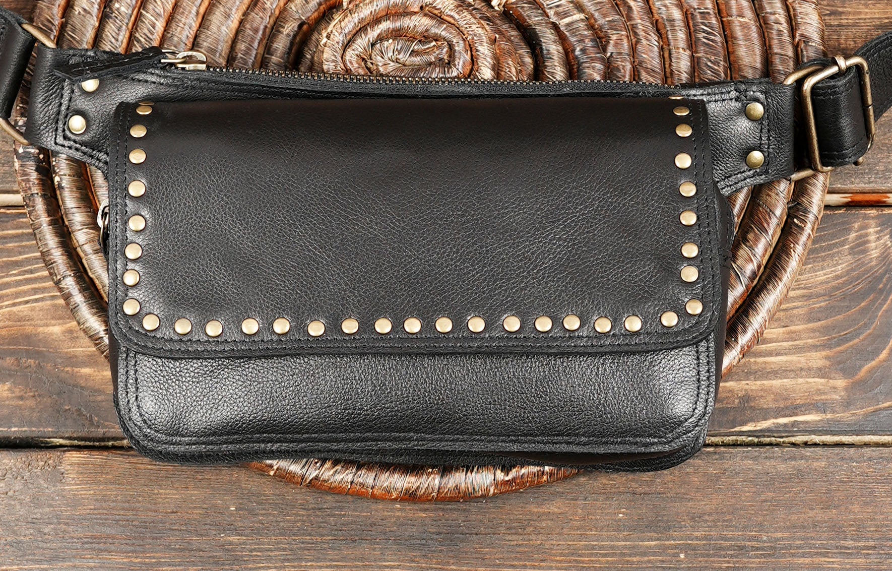 Unisex leather festival waist bag with adjustable strap and flap design