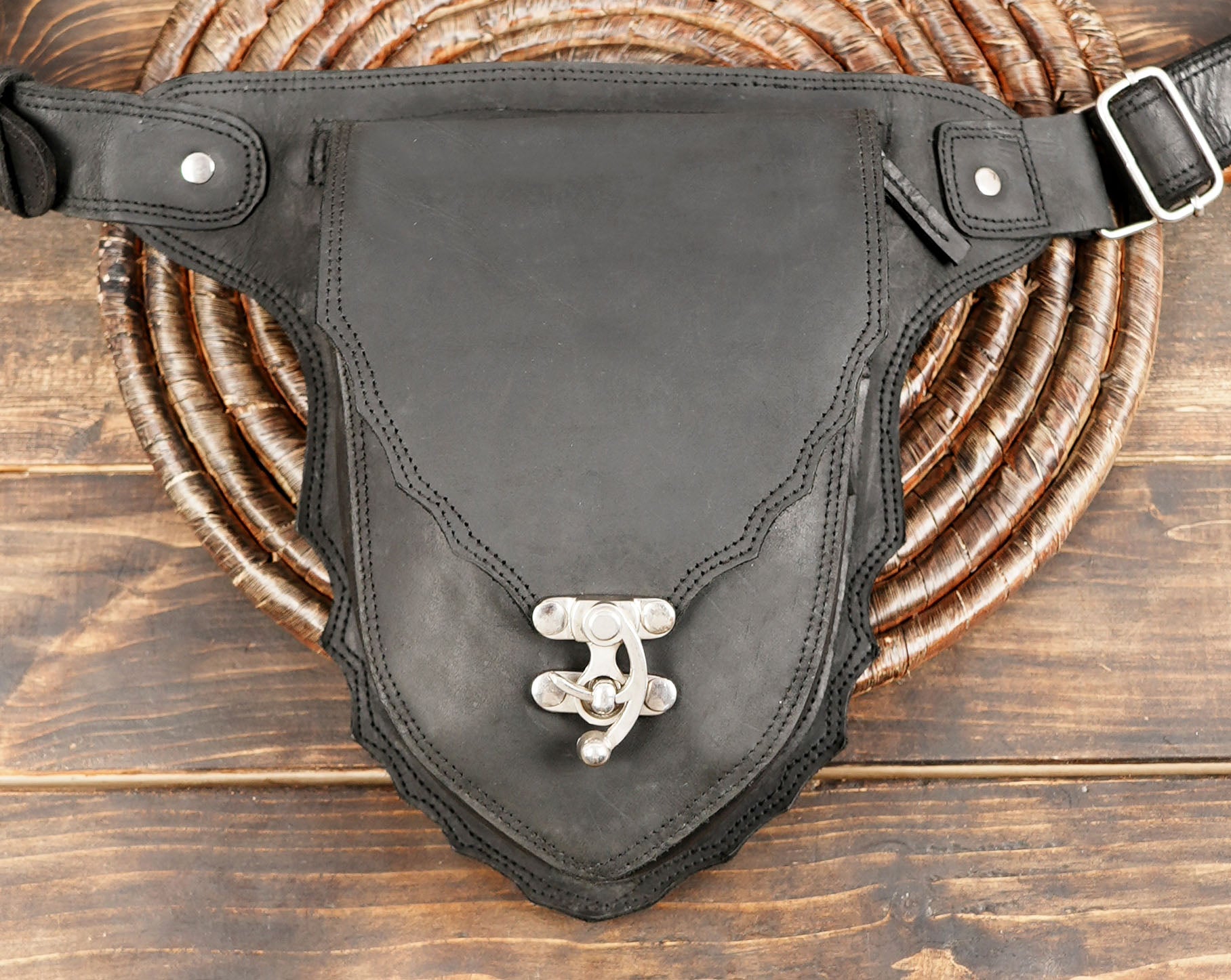 Leather waist belt with front pouch and metal hardware