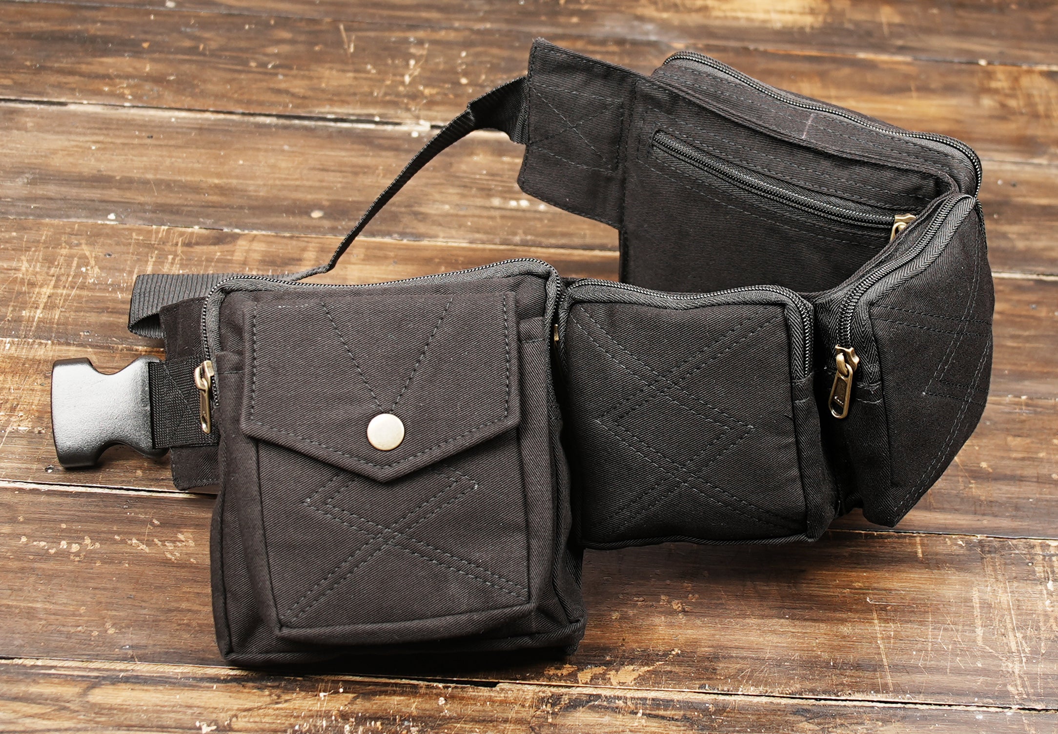 Unisex black cotton hip bag with utility compartments and zipper pockets