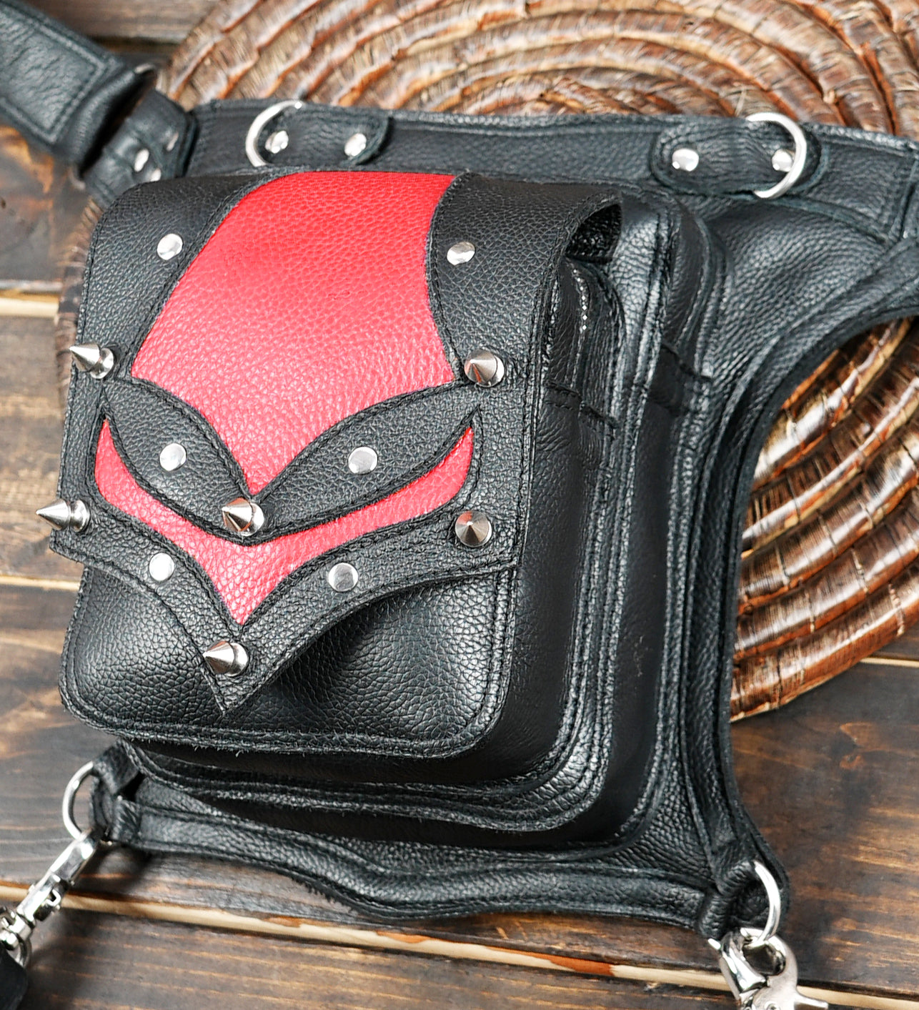 Festival-ready leather waist pouch in red and black design