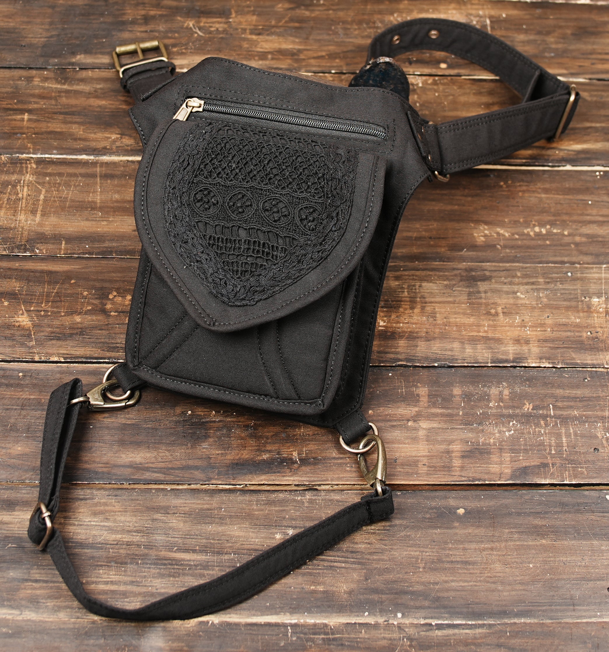 Motorcycle drop leg side pouch made from breathable handmade cotton fabric.