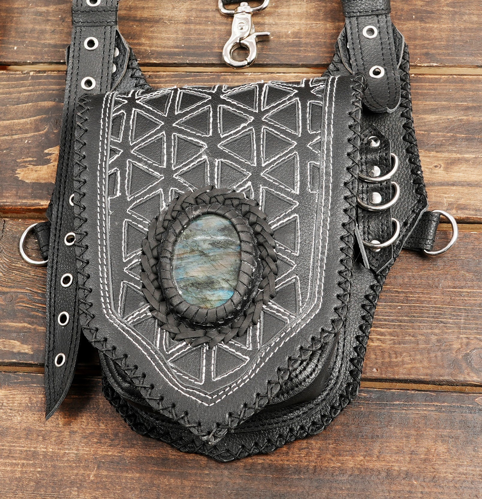 Adjustable gothic leather body holster with engraved pattern and stone inlay