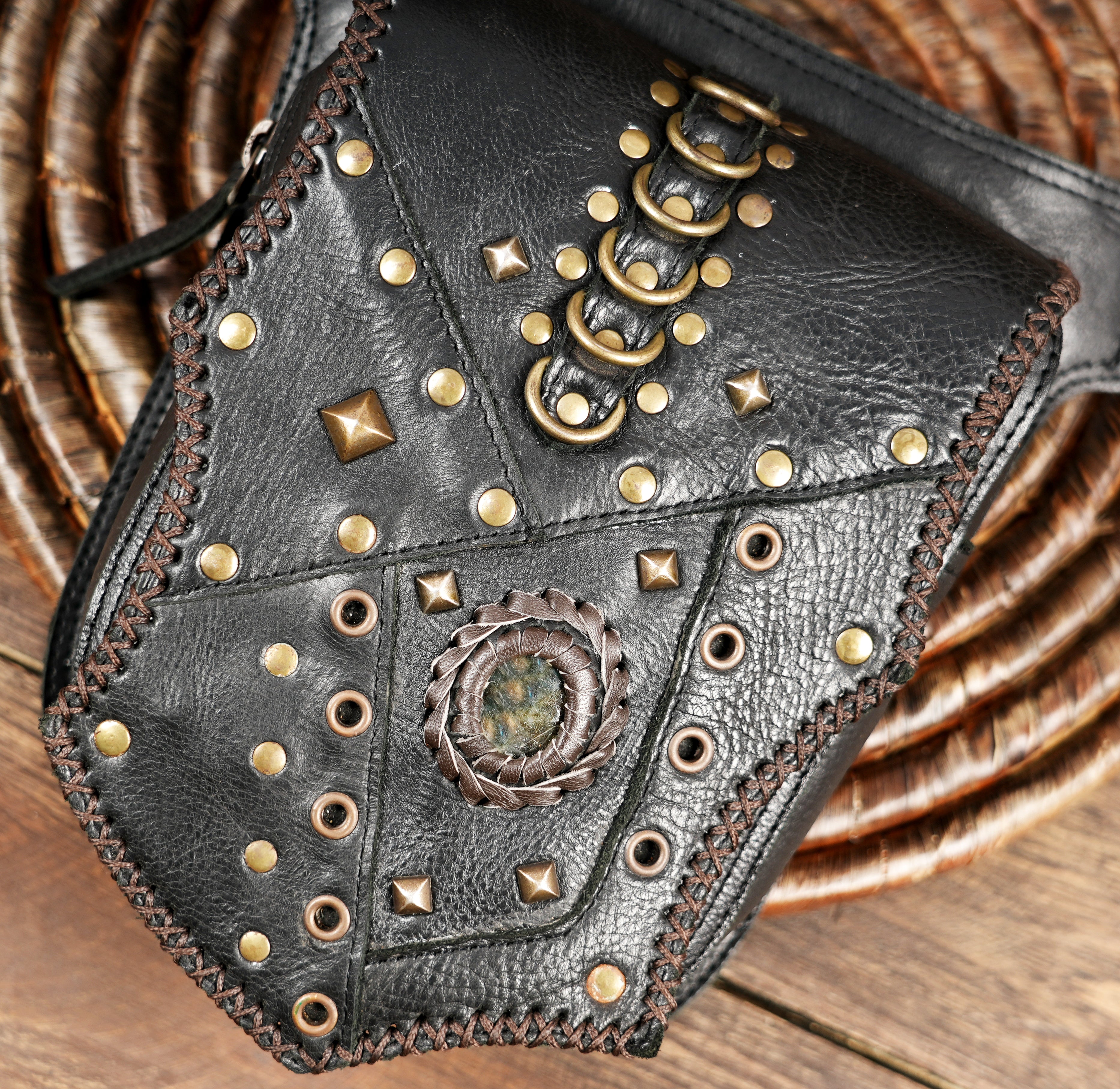 Utility leather waist belt with secure pouch and adjustable fit