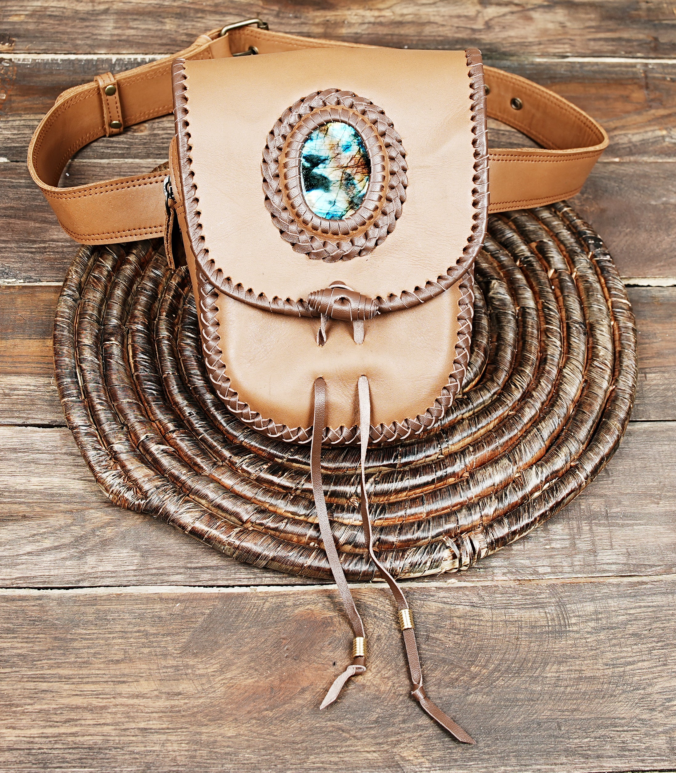 Leather utility waist belt with braided stitching and natural stone design