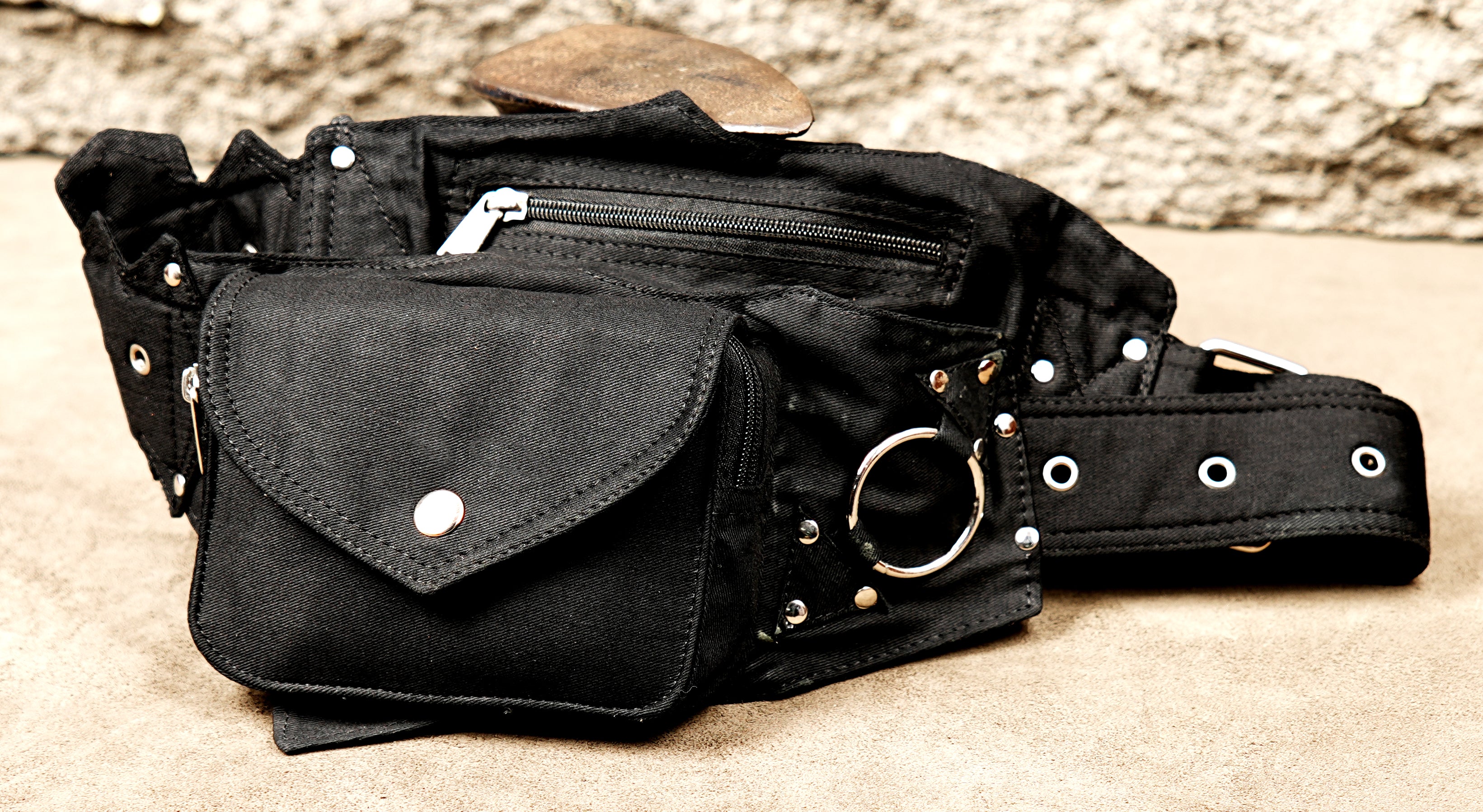 Durable black canvas utility belt holster with heavy-duty hardware.
