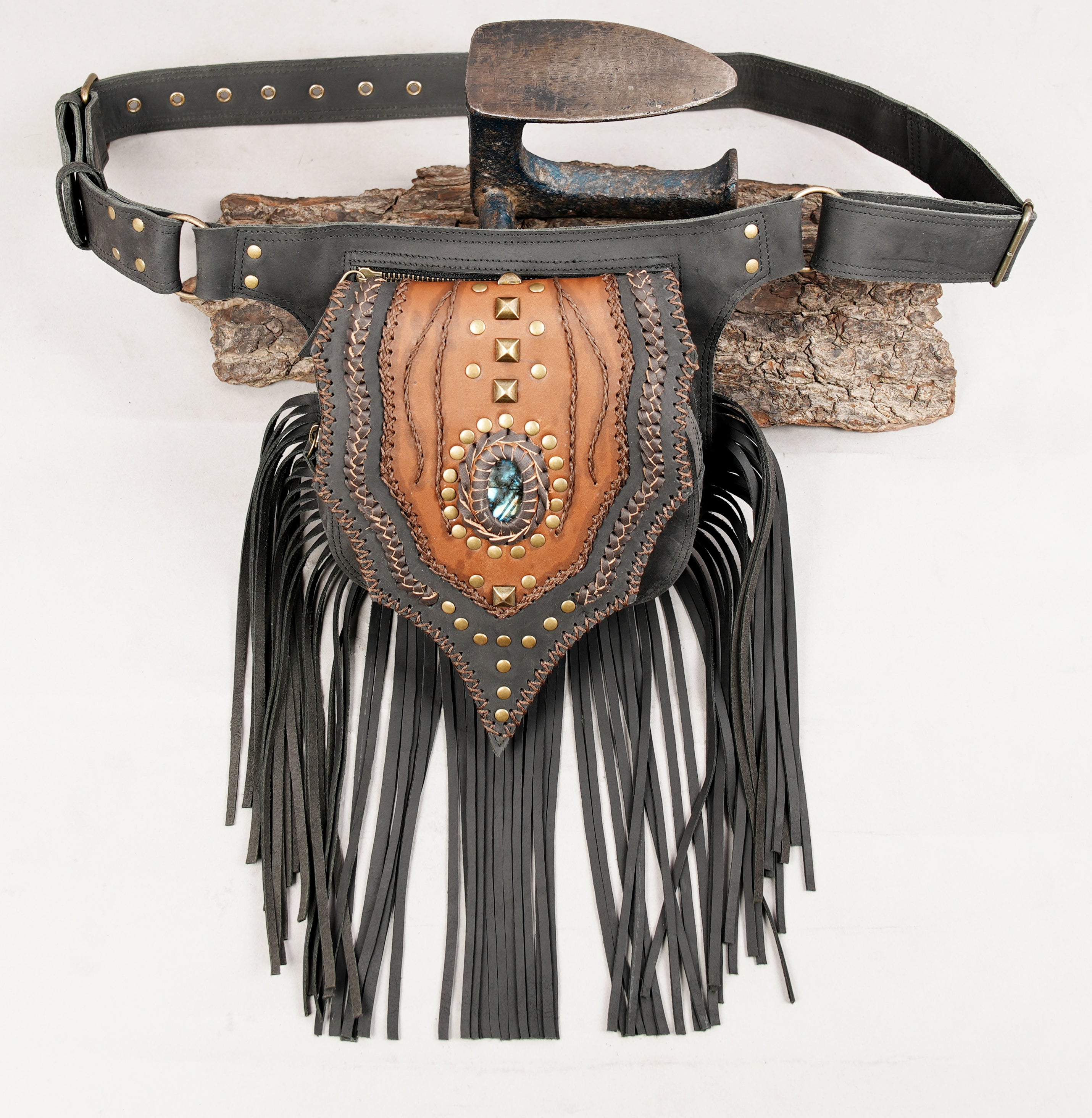 Western boho leather hip belt with fringe and stone detail.