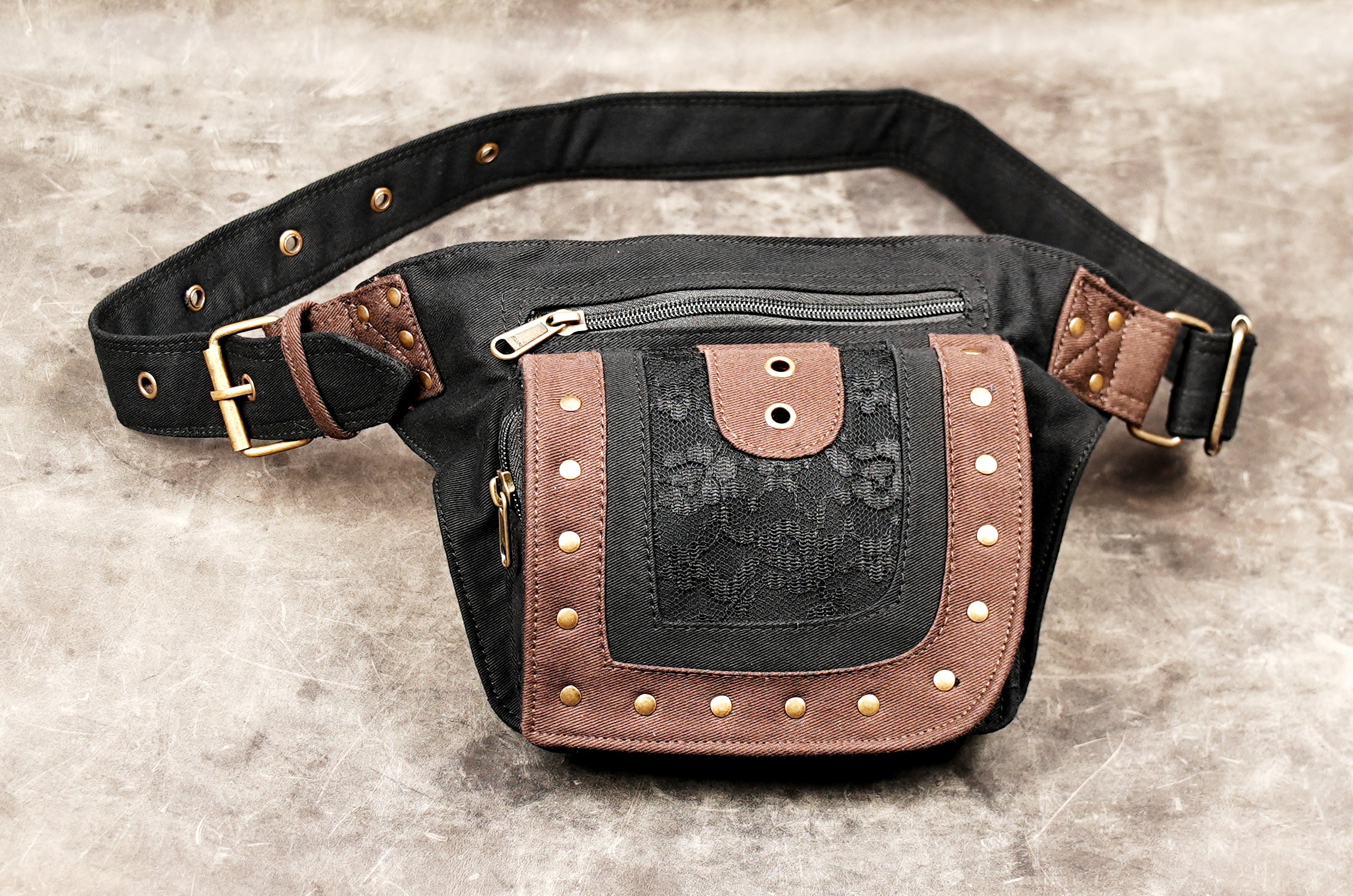 Black cotton waist pack with vintage brass hardware