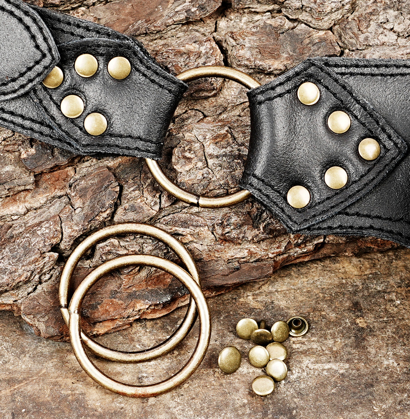 style leather hip belt with metal studs, star accents, and fringe