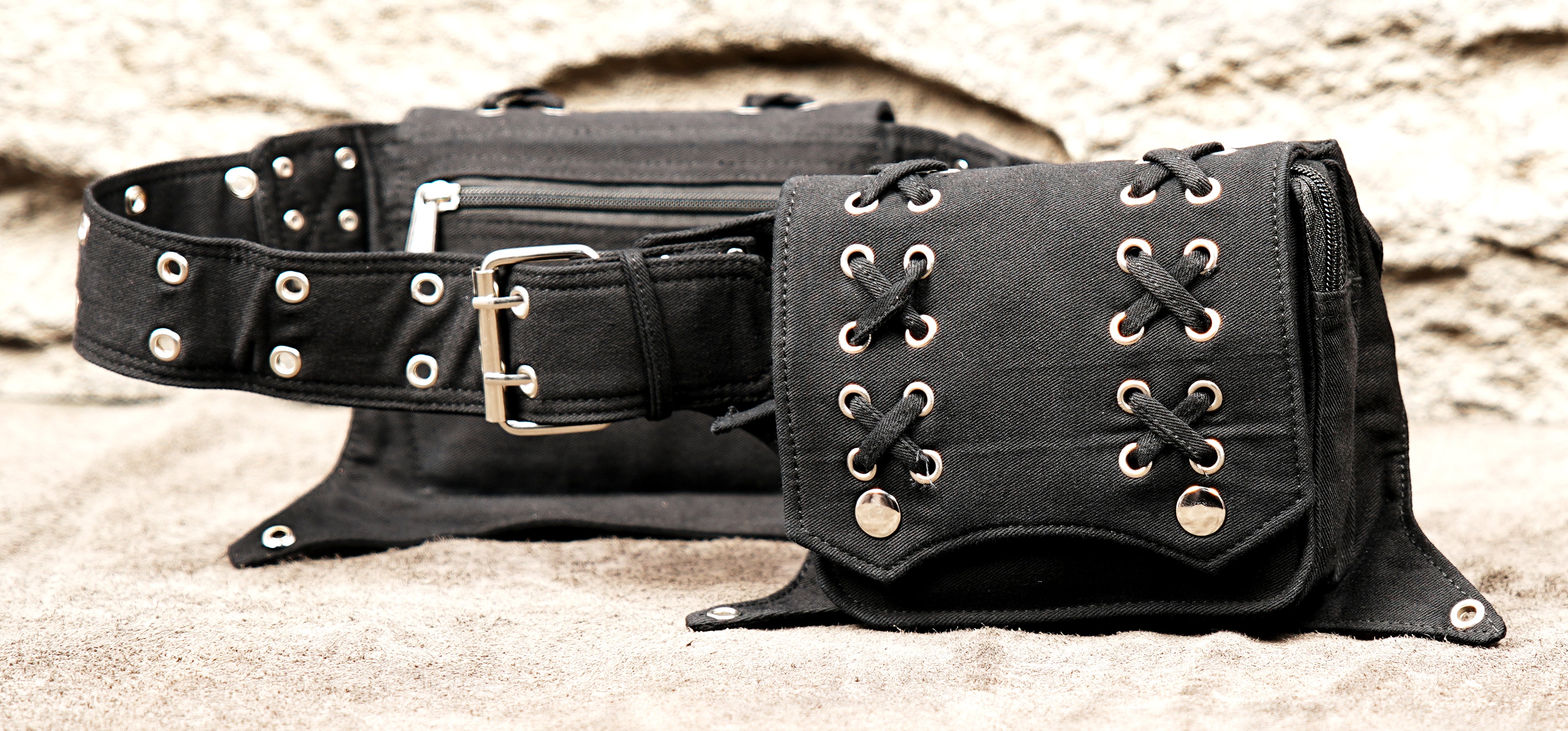 Gothic-style black canvas multi-pouch belt with metal rivets and pyramid studs.