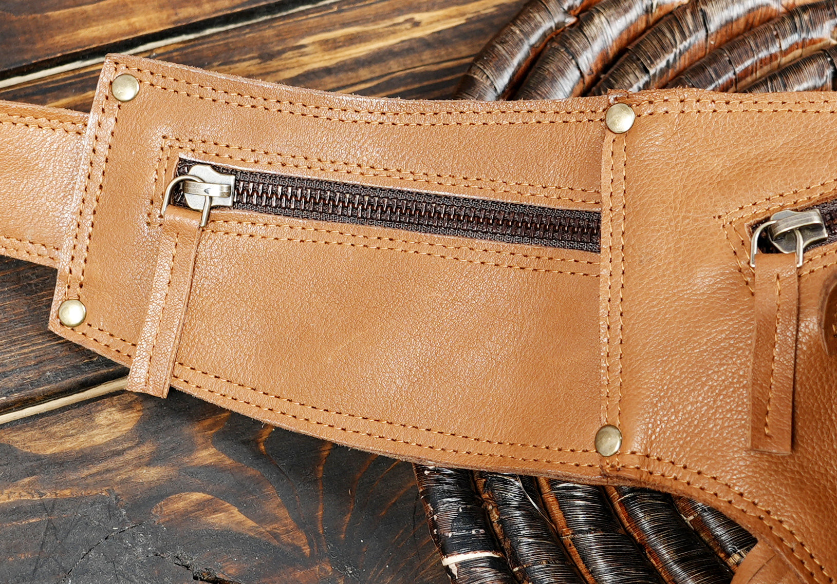 Festival leather waist belt with fringe and zipper compartments