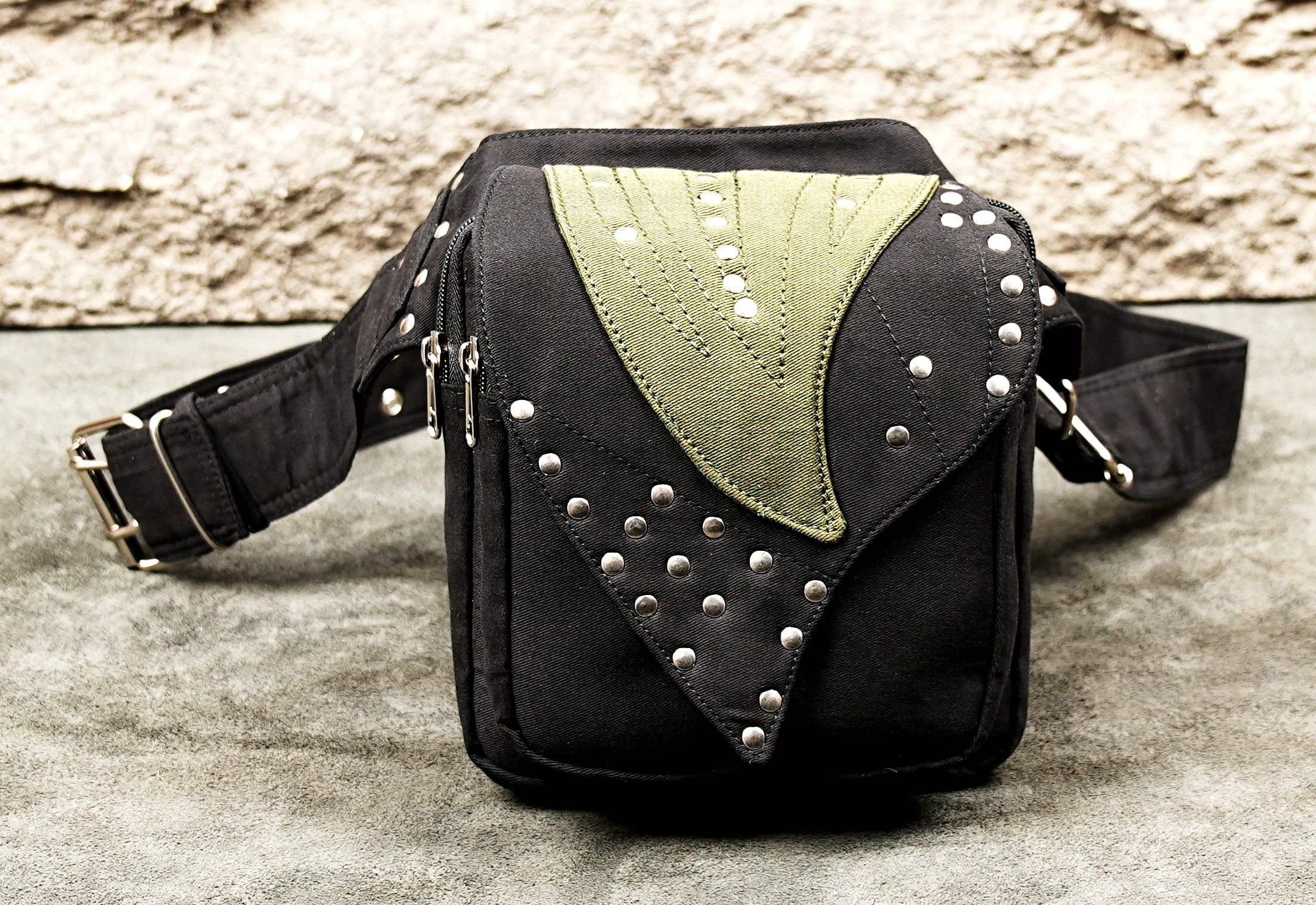 Adjustable black hip bag with handcrafted studded design