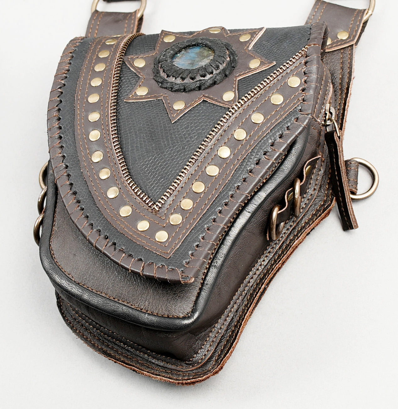 Steampunk leather holster rig with decorative star pattern
