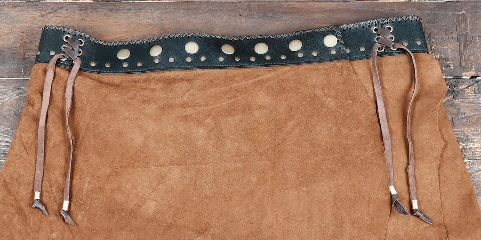 Decorative waistband with gemstone centerpiece and stud details for a boho touch