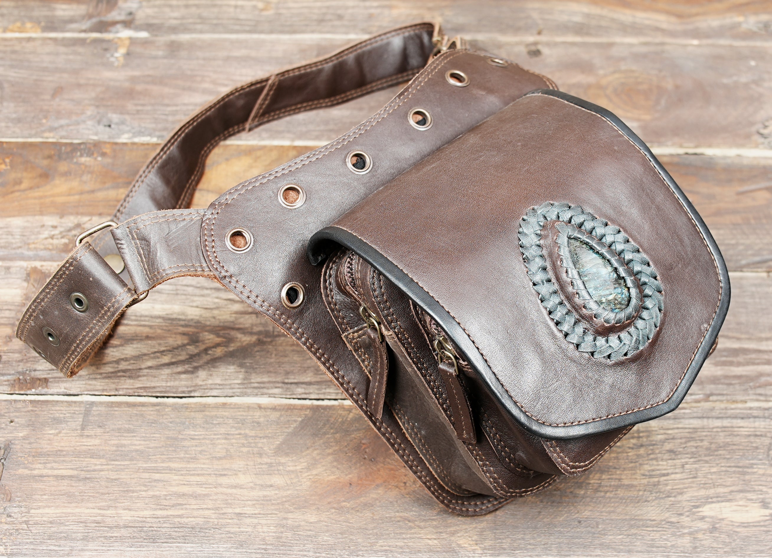 Back view of leather belt bag showing zipper pocket