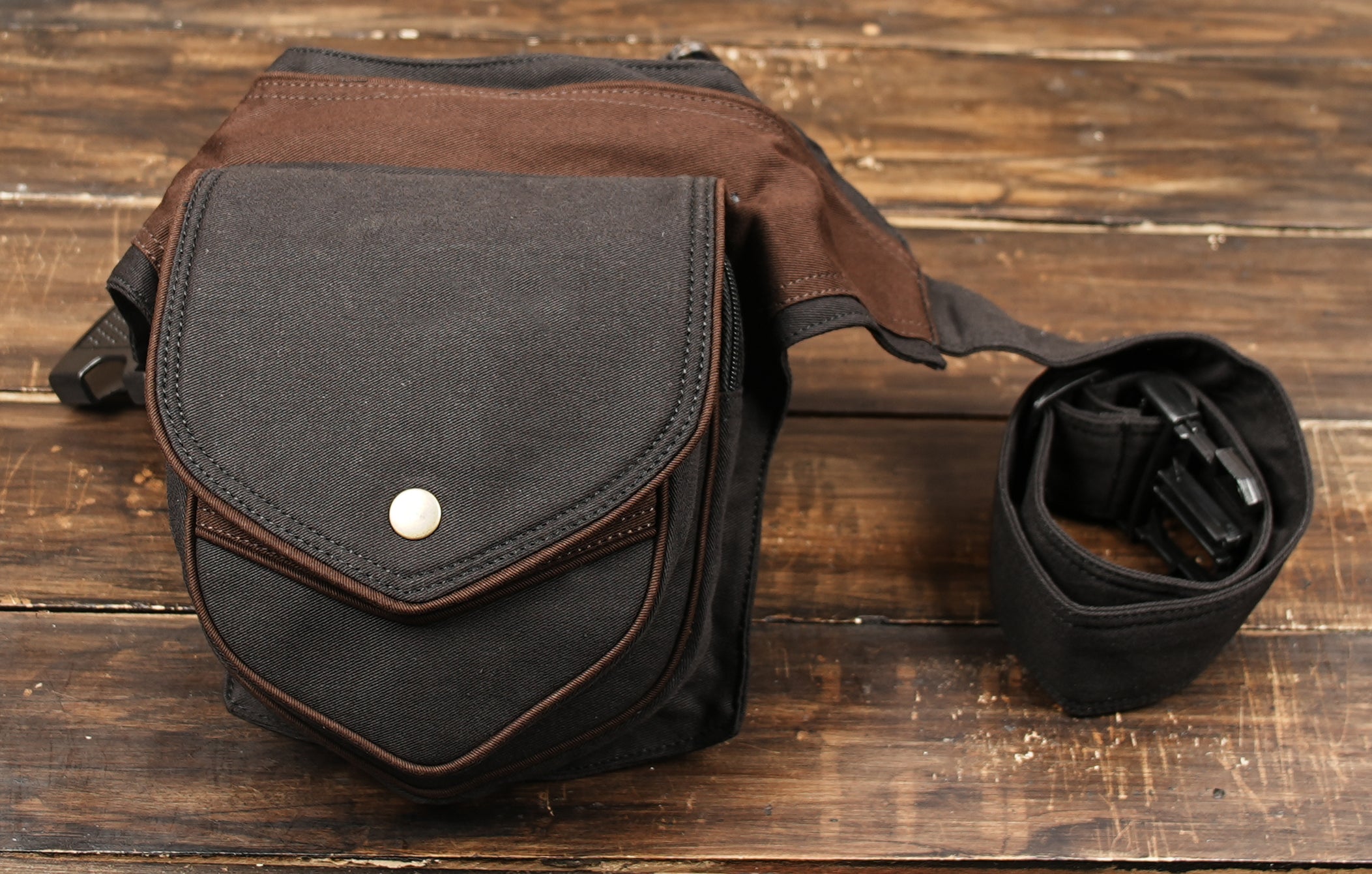 Utility waist pack with secure snap closure and compact storage pocket