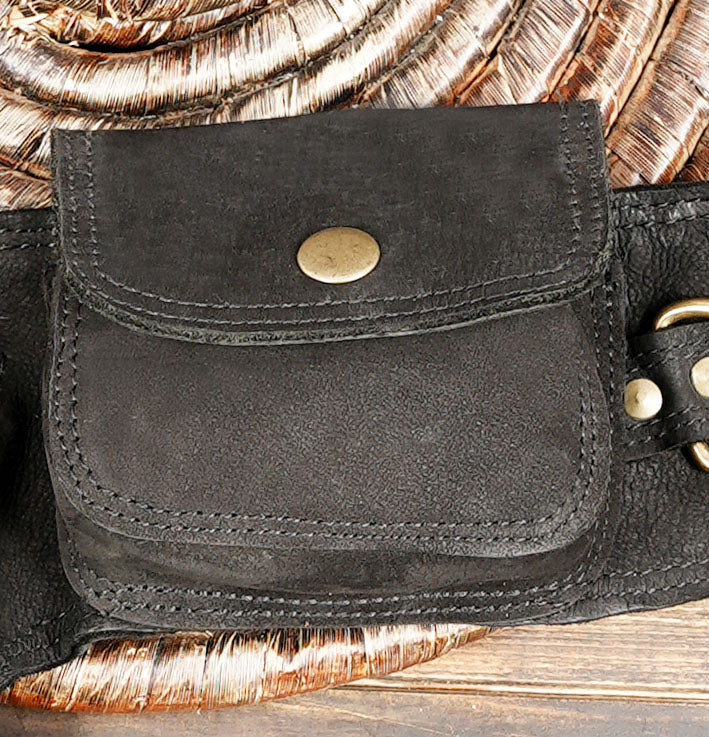 Festival style fringe waist pouch worn around hips