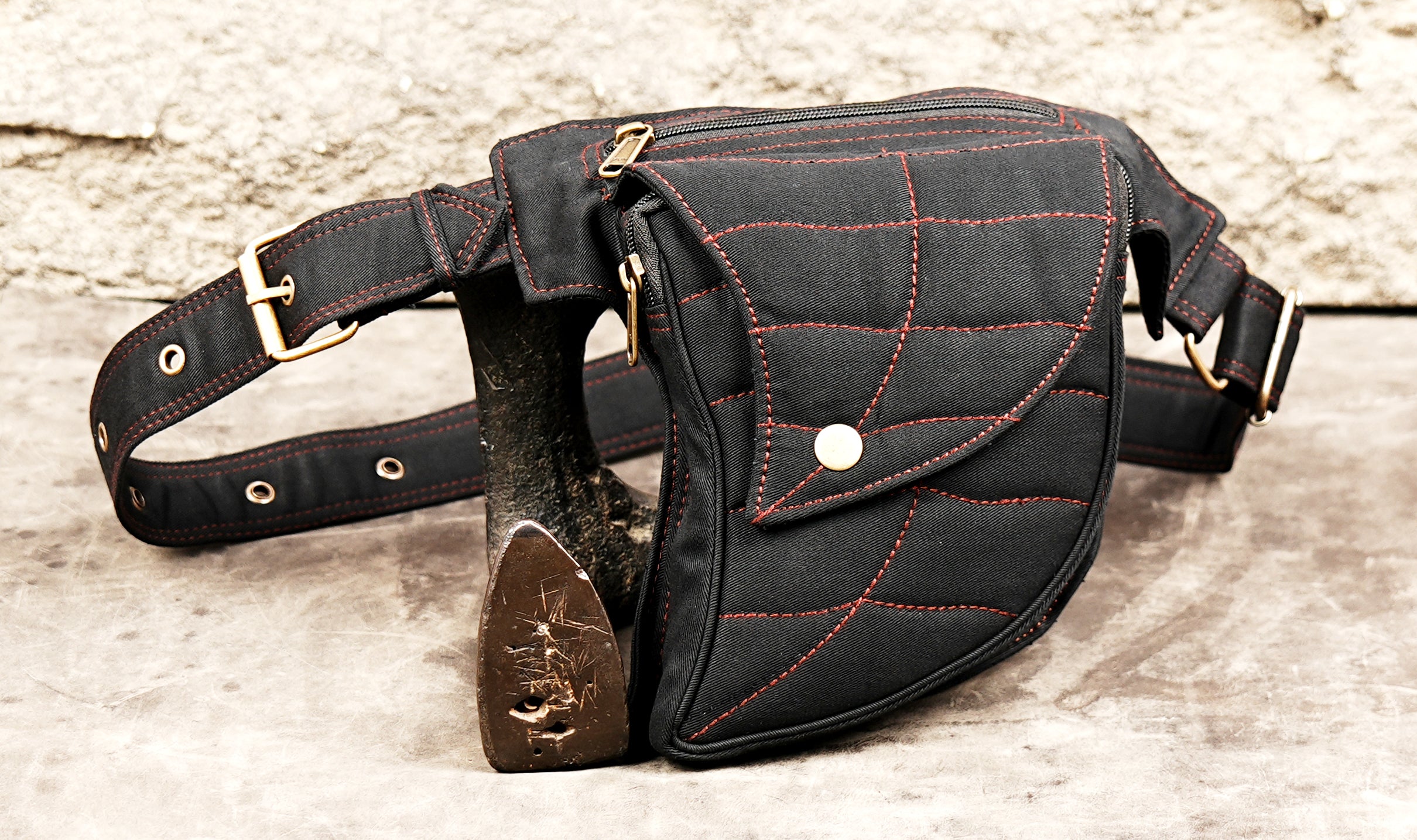 Alternative rave fanny pack with red contrast thread and brass hardware