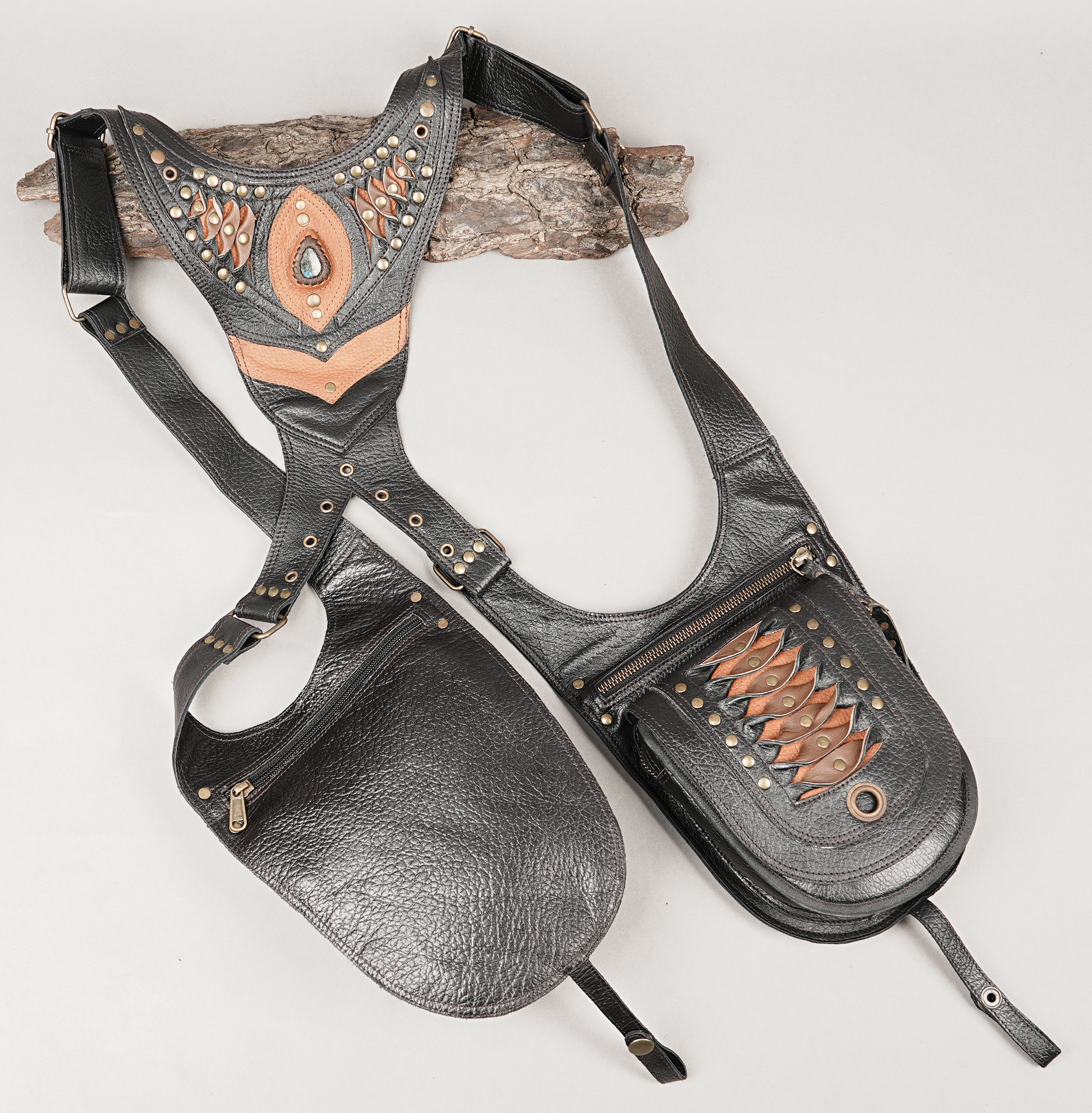 Premium leather chest holster with studded detailing and zip pockets